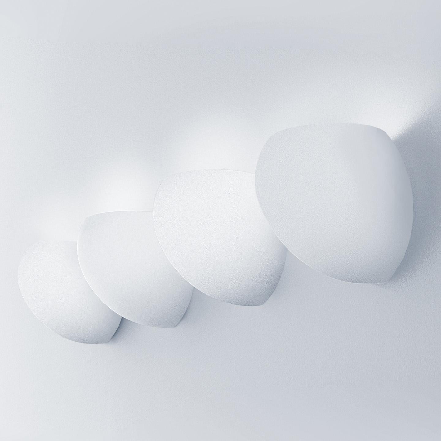 The Golf wall lamp is a whimsical, bestselling design from the historic Leucos design collection. Designed by Toso & Massari, the Golf collection includes a versatile array of pendants, wall and ceiling lamps. Each comes with the option of a hand