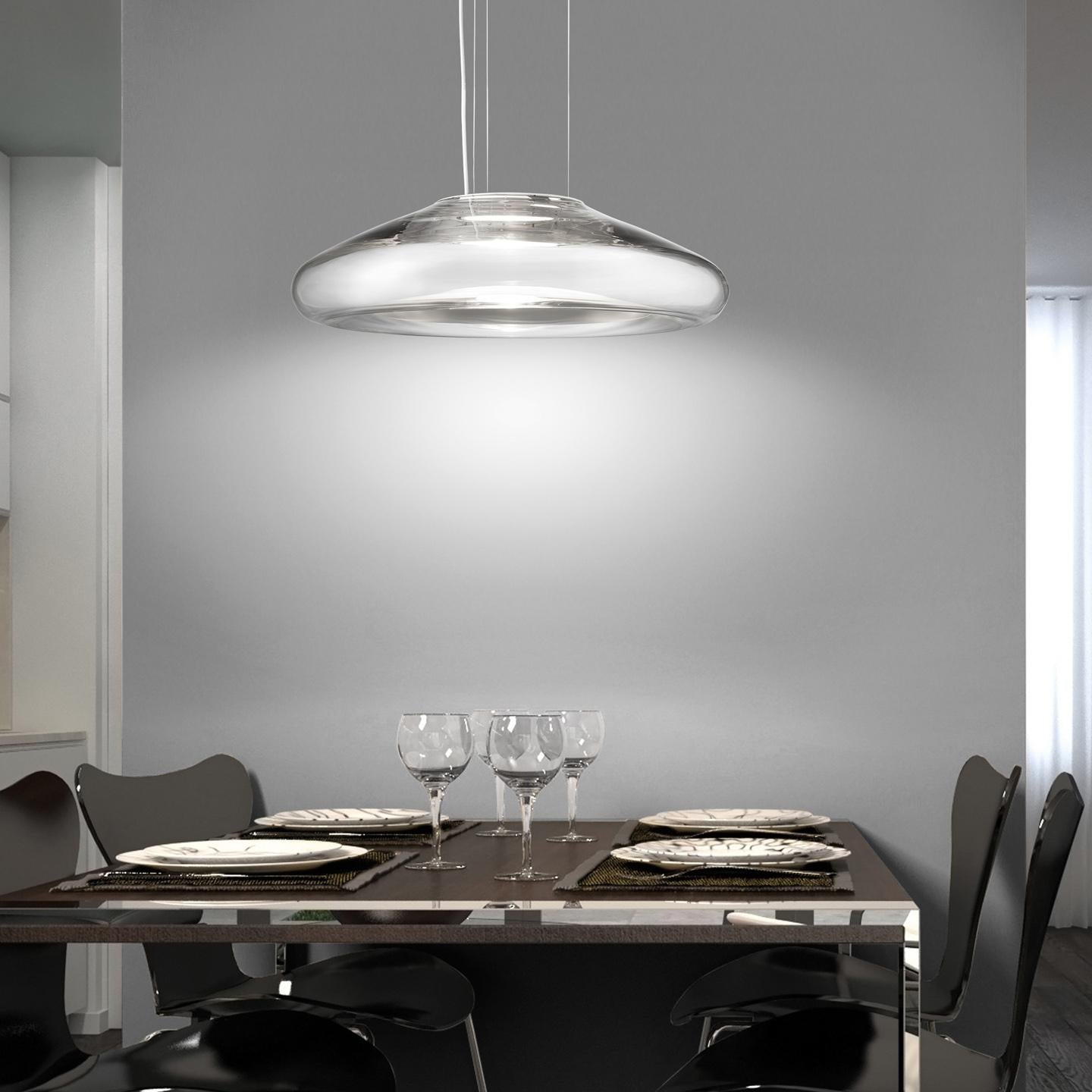 The Keyra creates beautiful light for your home, office or contract space with its beautiful contemporary shape and unique finish. Designed by Roberto Paoli in 2011, the Keyra’s hand-blown shape dimples in the middle and becomes translucent. This