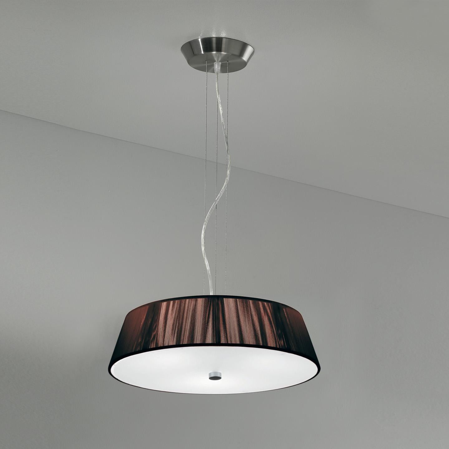 The Lilith Pendant is an elegant lighting solution with a stunning light effect created by threading thin string in a consistent pattern across the shade. As you engage it from different viewpoints, the light pattern shimmers and changes. The result
