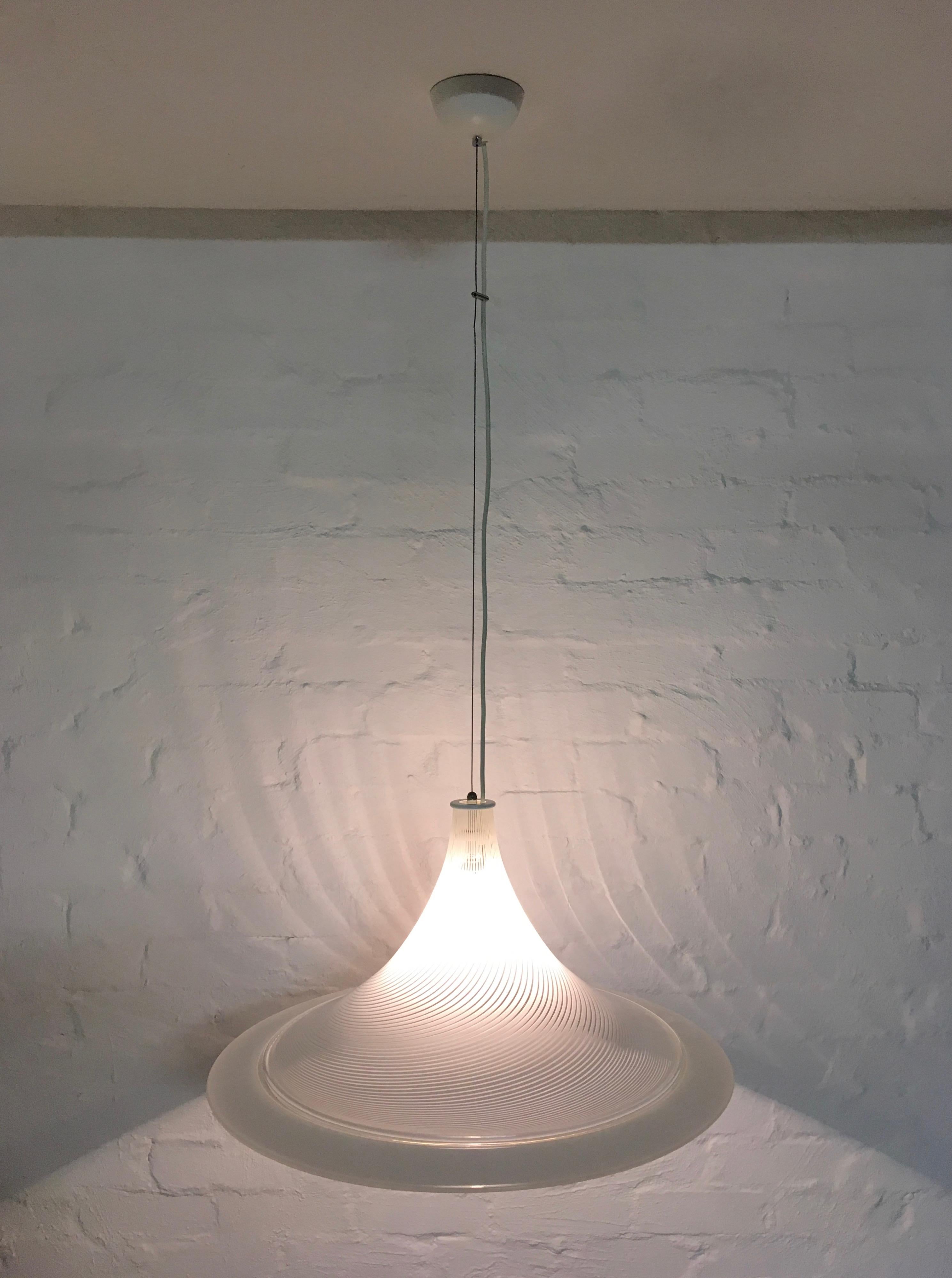 A substantial white Murano 'Tessuto' glass 1970s pendant fitting, probably by Leucos. Venini is another possible producer. 

Stunningly simple and elegant. A wonderful shape, with a lovely broad white glass edge, makes this one of the most graceful