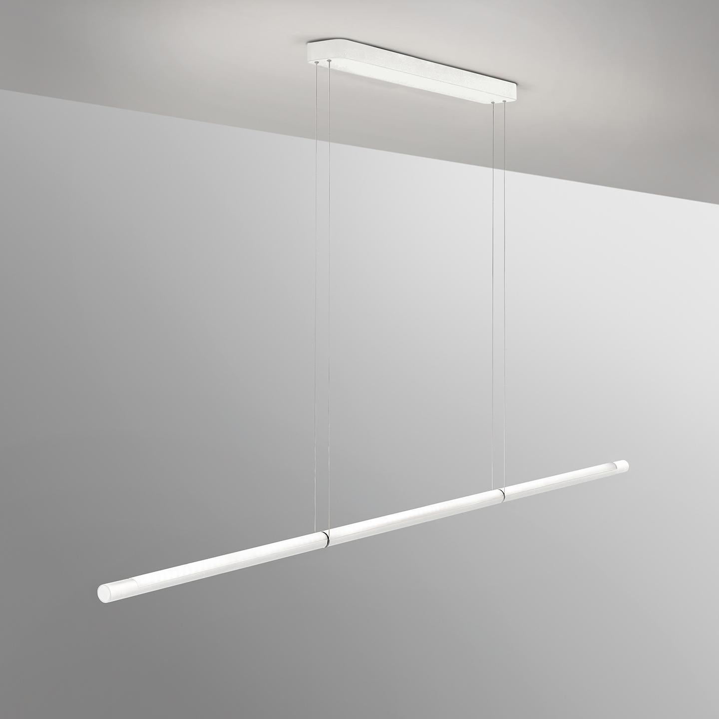 The Volta, by From Industrial Design, is an innovative linear suspension lamp that takes state of the art technology and compacts it into a simple form and user experience. The lamp floats on two cables that both power the light and suspend it. The