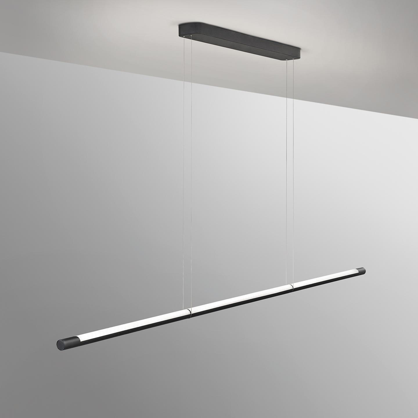 The Volta, by FROM Industrial Design, is an innovative linear suspension lamp that takes state of the art technology and compacts it into a simple form and user experience. The lamp floats on two cables that both power the light and suspend it. The