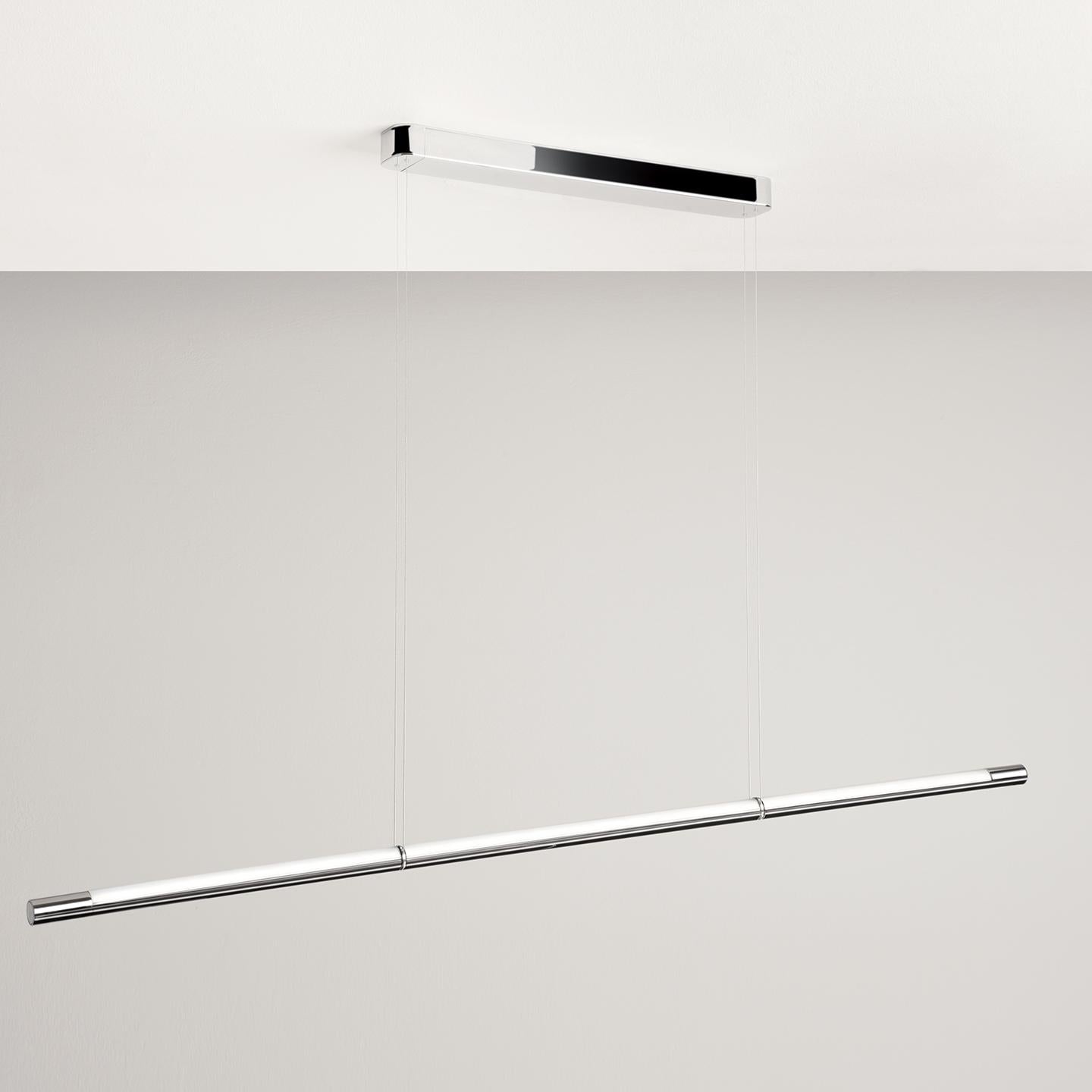 The Volta, by FROM Industrial Design, is an innovative linear suspension lamp that takes state of the art technology and compacts it into a simple form and user experience. The lamp floats on two cables that both power the light and suspend it. The