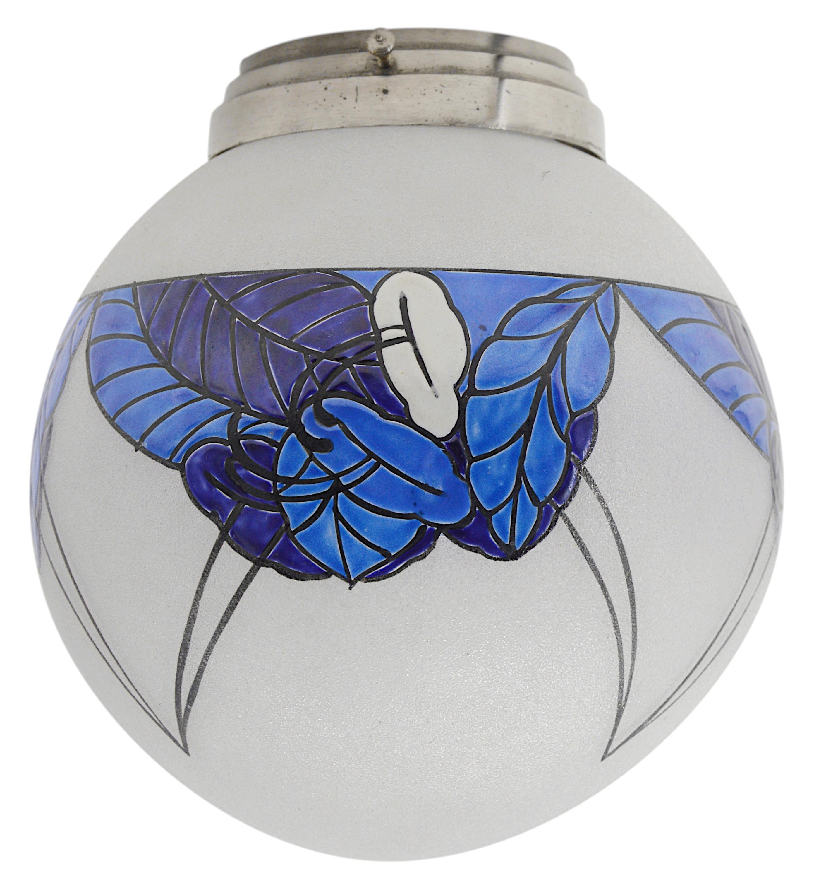French Art Deco flush mount by LEUNE, 28bis rue du Cardinal Lemoine, Paris, France, 1920s. Enameled granite glass shade hung at its nickel plated brass fixture. Measures: Height : 9.45