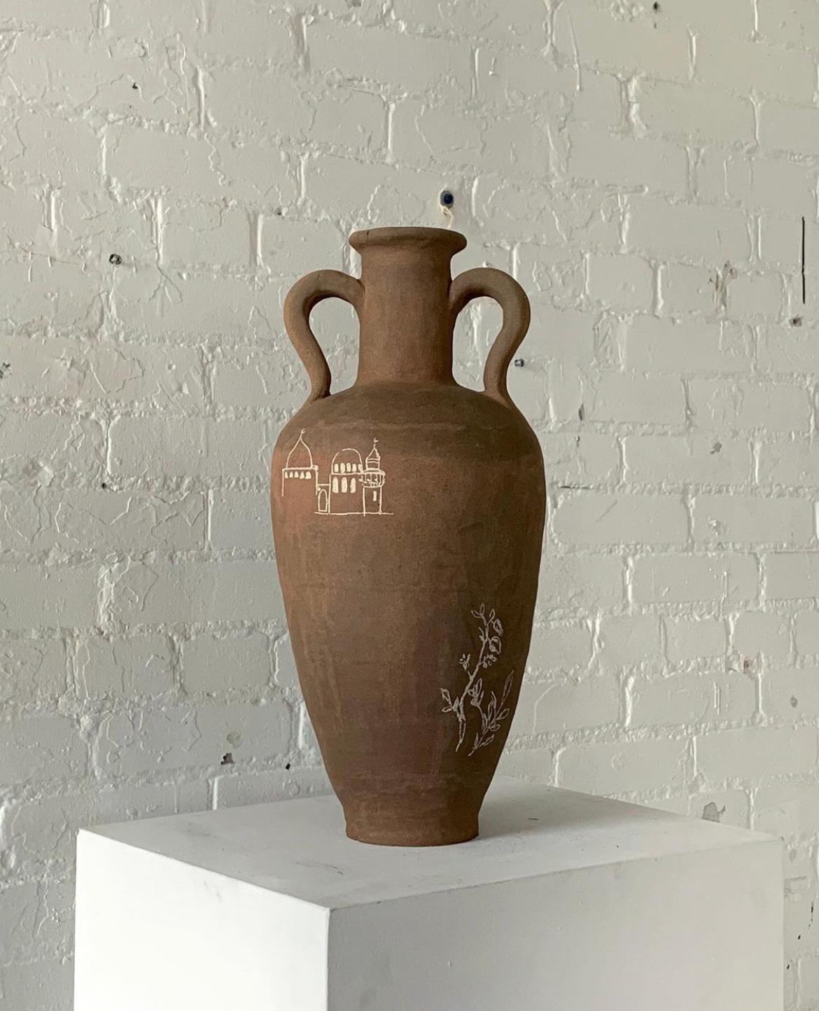 Levant vase by Solem Ceramics
Dimensions: Ø 25.5 x H 48.5 cm.
Materials: Red stoneware, White underglaze, glaze
This vase is water safe.

Solem’s work pulls from memories of the architecture and community within SWANA and Southeast Asia