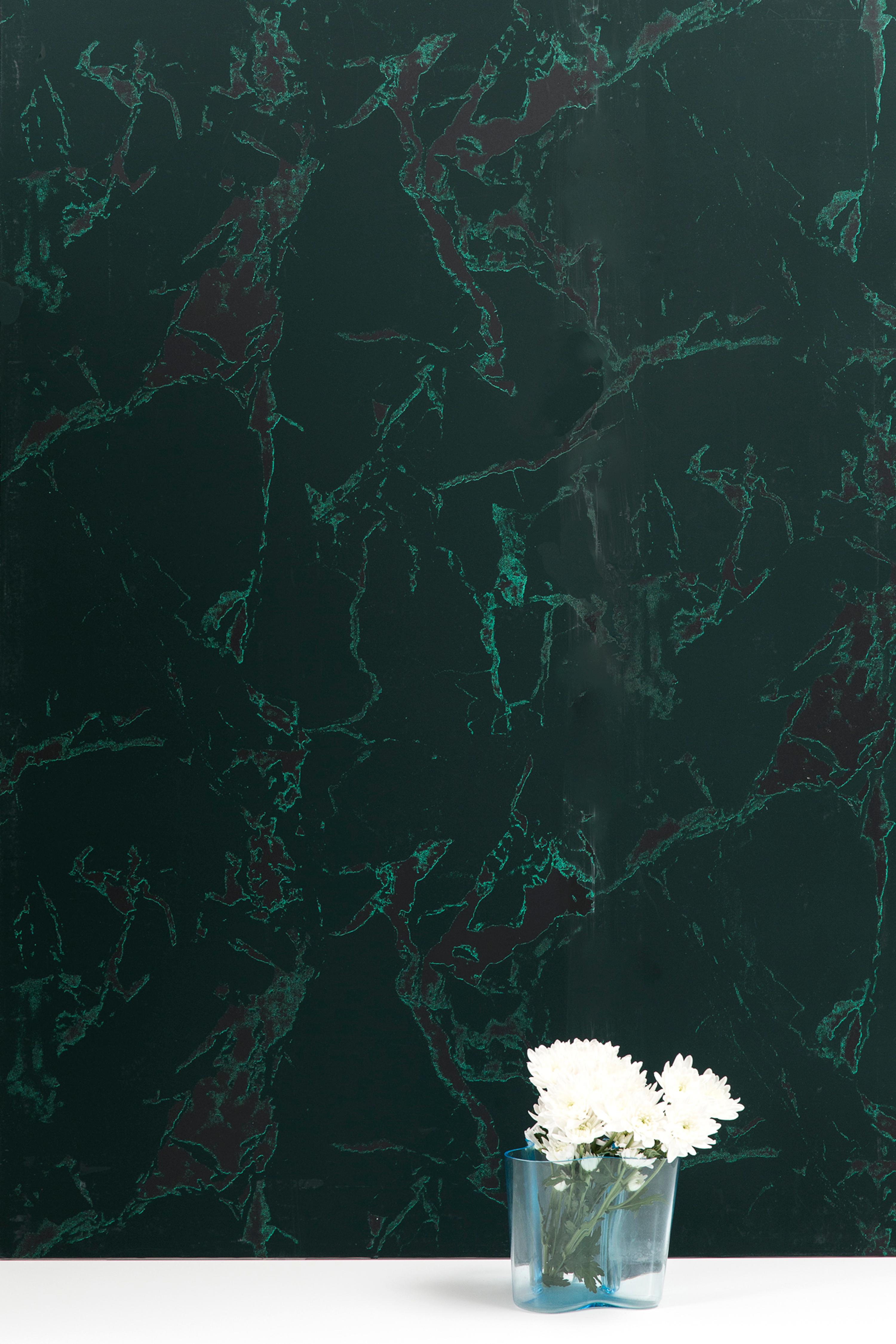 Empress green is a luxurious hand-printed wallpaper with dark pine green and black with pops of acid green that create a marble effect pattern. It is also washable, strippable, unpasted, and Class A fire rated. Made in the USA.

Half drop