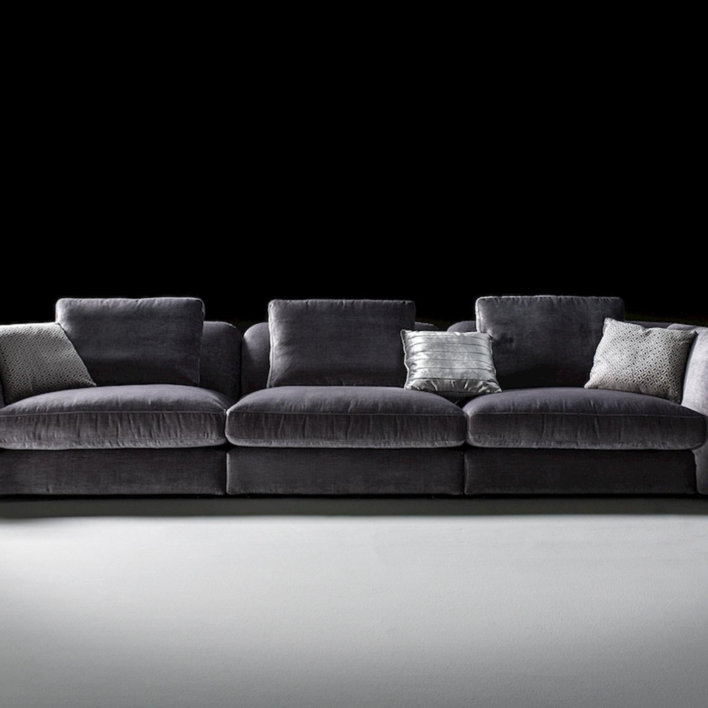 Elegant and comfortable, this sofa features a delicate gray hue that will infuse any interior with sophistication. Furnished with an elastic belt spring system, the poplar structure is covered with thermo-bonded fiber and flexible jersey fabric. The