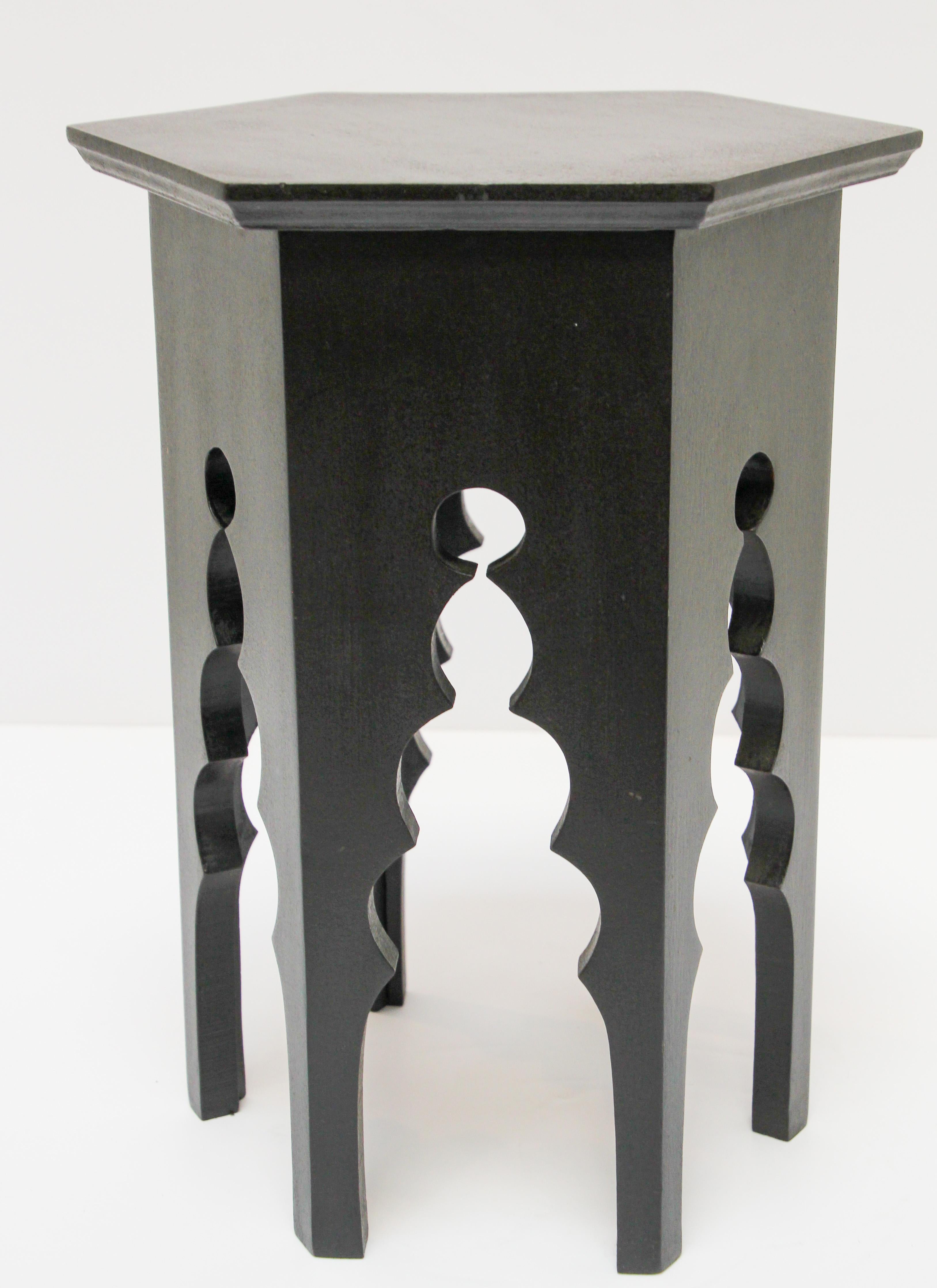 Levantine Hexagonal occasional side accent table with Moorish arches.
Moroccan style wood table refinished in black paint.
Very simple modern Moroccan contemporary design.
Will work with any modern or traditional decor.


  