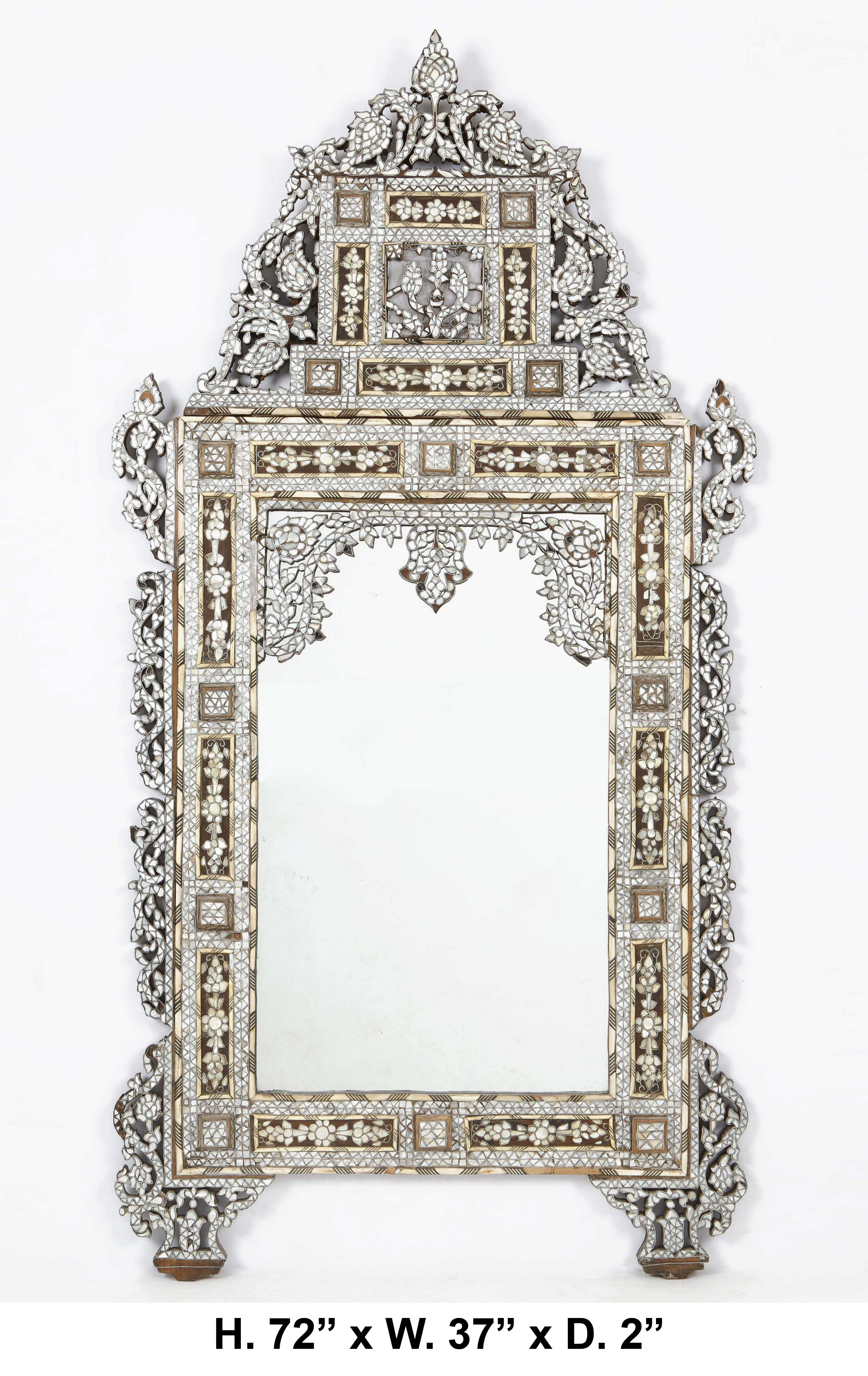 Sensational and large Levantine mother of pearl and pewter inlaid mirror, late 19th/early 20th century. possibly Moorish 
The whole mirror is finely inlaid with mother of pearl, each piece of mother of pearl is out lined with pewter is out lined