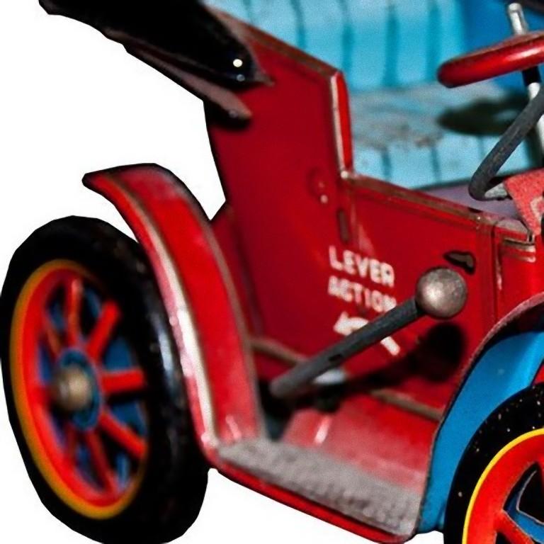 Dieses Auto von Lever Modern Toys ist ein altes Cabrio-Spielzeug. 

Hergestellt in Japan von Modern Toys in den 1960er Jahren. 

Modell n. A-1620. 

Wenn Sie den Hebel in die Richtung des angezeigten Pfeils ziehen, bewegt sich das Auto