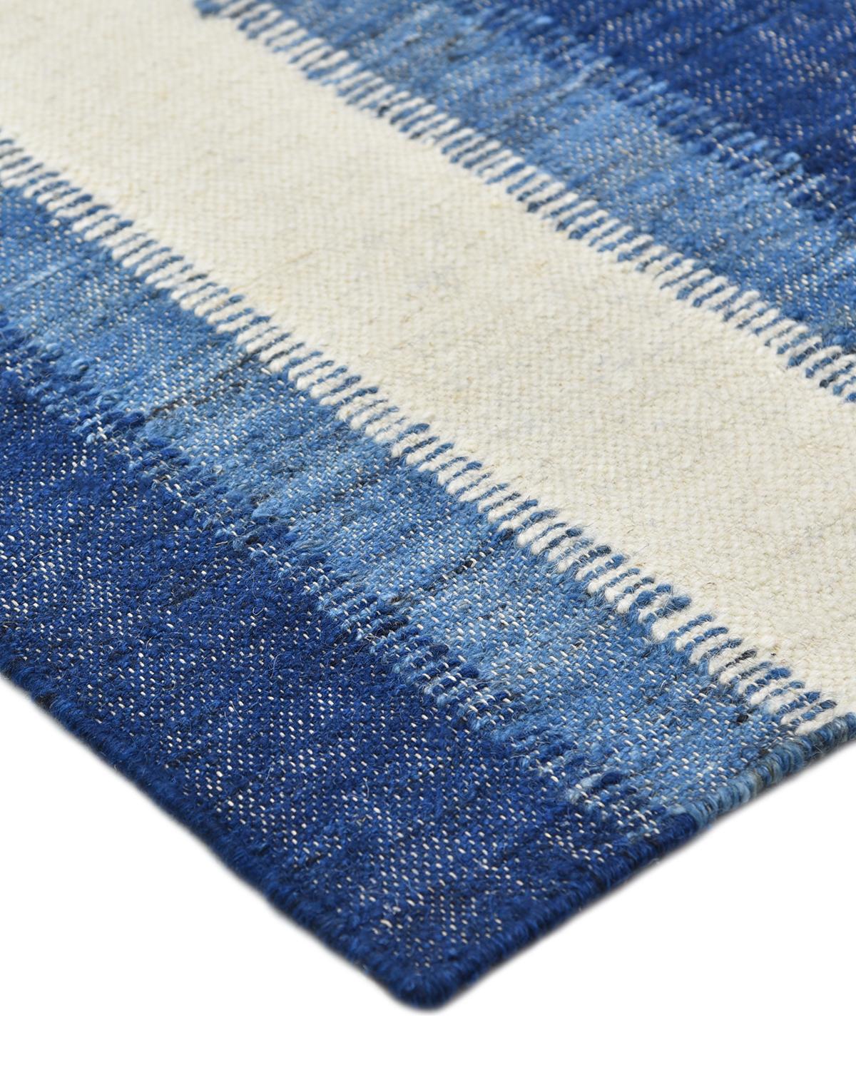 Durable and low-maintenance, flatweave rugs are especially popular for high-traffic rooms. The Flatweave collection is beautiful as well as practical. The quiet patterns and understated colors make them suited for a traditional living rooms as well