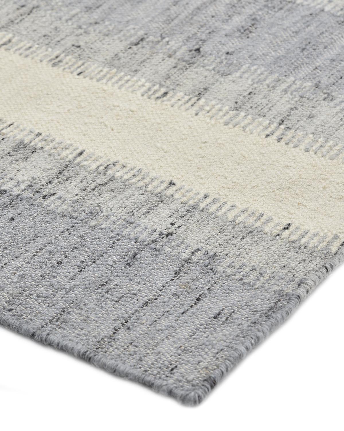 Durable and low-maintenance, flatweave rugs are especially popular for high-traffic rooms. The flatweave collection is beautiful as well as practical. The quiet patterns and understated colors make them suited for a traditional living rooms as well