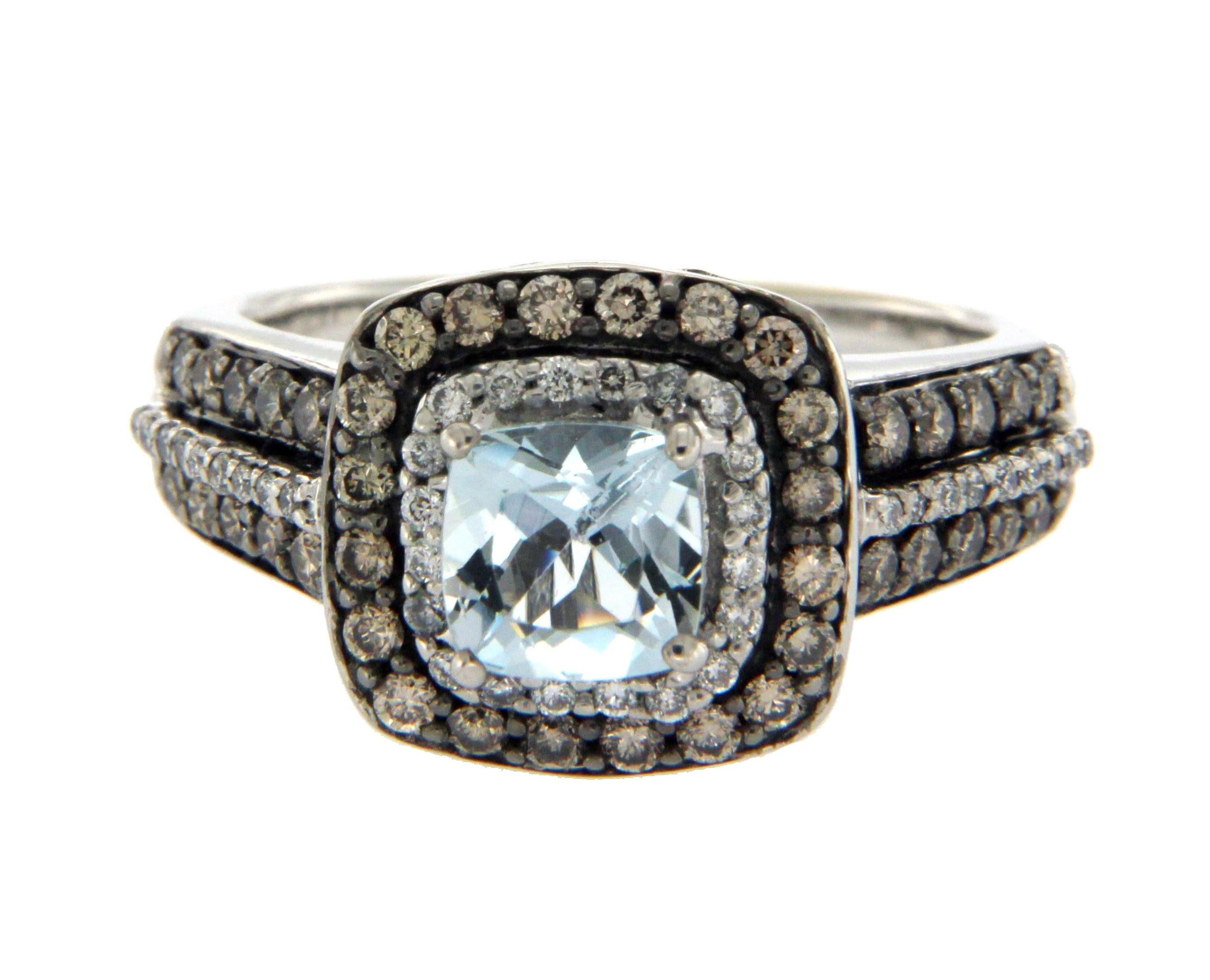 Type: Ring
Top: 12 mm
Band Width: 2.75 mm
Metal: White Gold 
Metal Purity: 14K
Hallmarks: Levian 14K 
Total Weight: 6.9 Gram 
Size: 6.75
Condition: Pre Owned
Stone Type: Blue Topaz & Diamonds