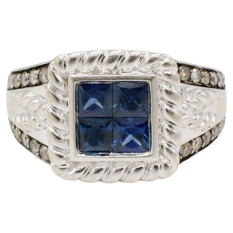 Levian 14 Karat White Gold Blue Sapphire & Natural Chocolate Diamond Ring 
Metal: 14k white gold
Weight: 8.75 grams
Diamonds: Approx. 0.25 CTW chocolate brown SI round natural diamonds
Size: 10.5 (US)
Width: 10.3mm
