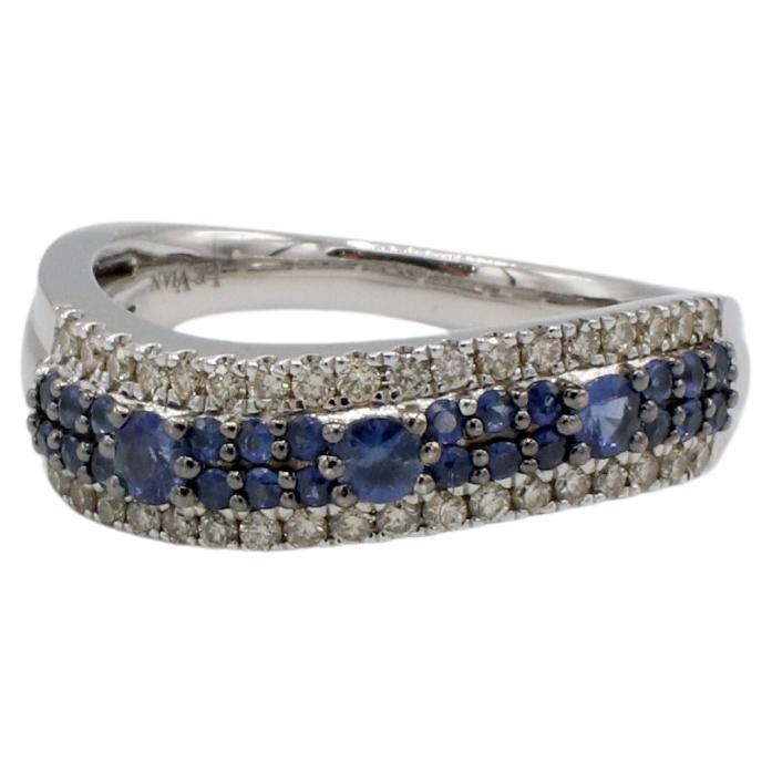 Anello a onda con diamante naturale e zaffiro blu in oro bianco 14 carati Levian