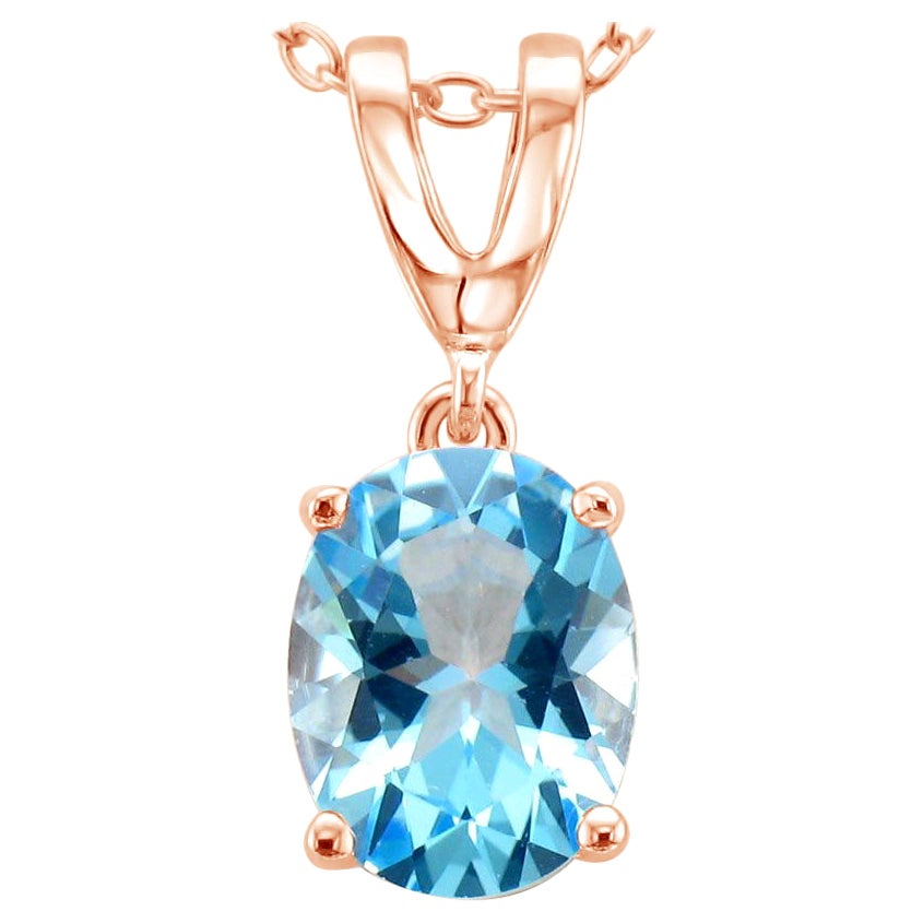 LeVian Bague en plaqué or rose 14 carats et argent sterling .925 avec topaze bleue taille ovale en forme de V en vente