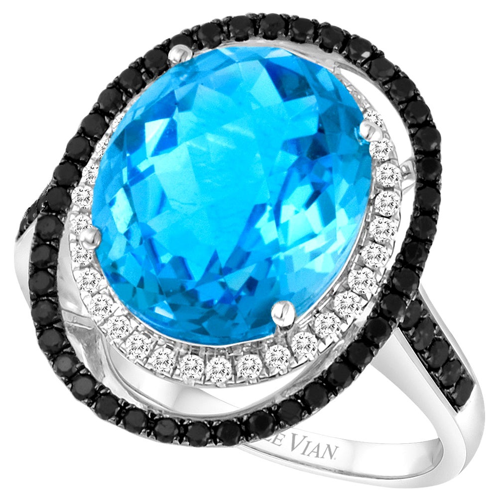LeVian Bague en or blanc 14 carats avec topaze bleue, diamants ronds et noirs et magnifique halo fantaisie en vente