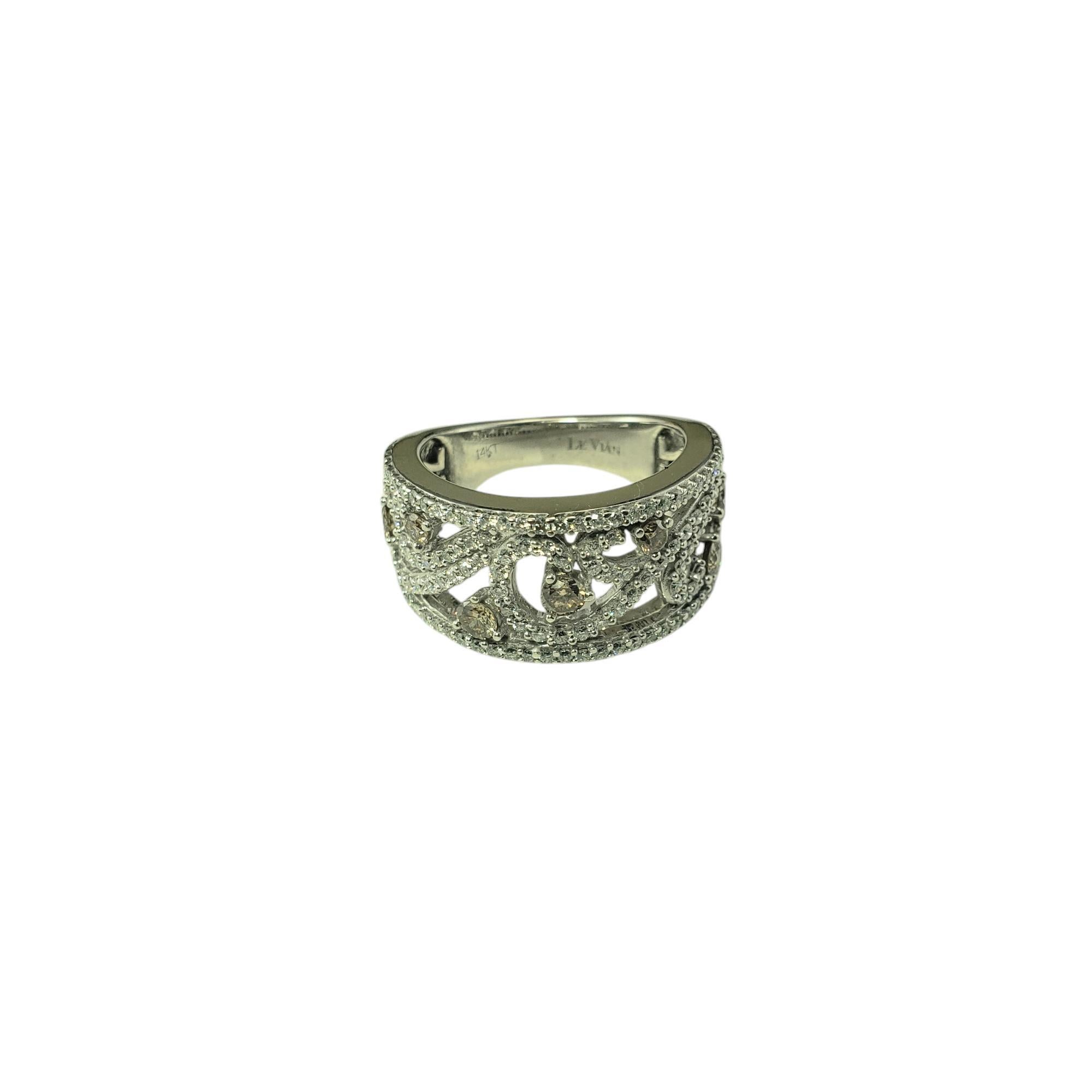 LeVian 14K White Gold Champagne and White Diamond Band Ring Size 6.75

This sparkling band is a stunning fusion of elegance and signature style, featuring a dazzling mix of champagne and white round brilliant cut diamonds. Width: 11 mm.
Shank: 4
