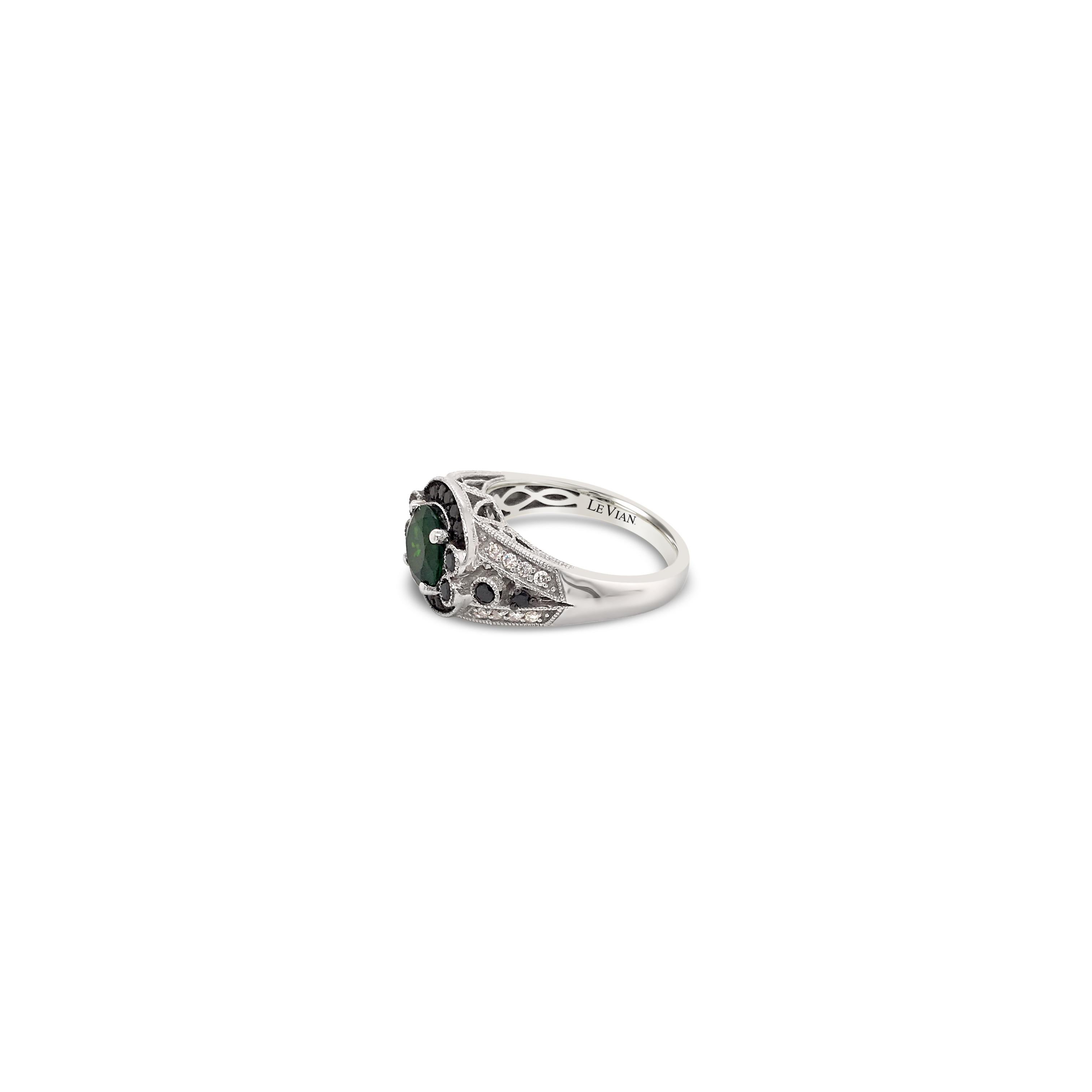Arusha Exotics Ring featuring 1  1/4 cts. Pistachio Diopside®, 1/3 cts. Blackberry Diamonds® , 1/10 cts. Vanilla Diamonds®  set in 14K Vanilla Gold®
