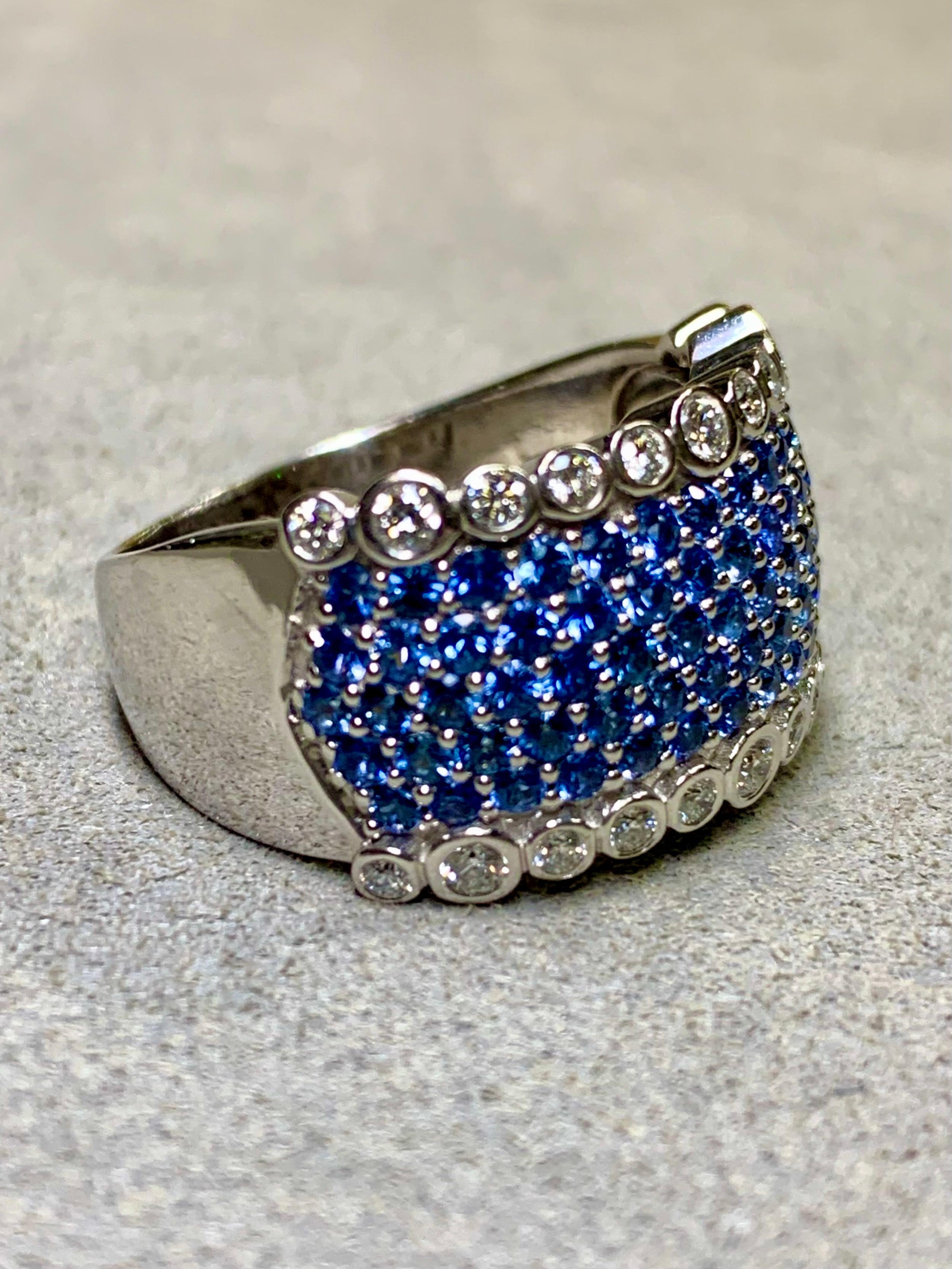LeVian wide band ring done in 14K white gold and bezel set with approximately .80ctw in G-I Vs2-Si1 clarity round diamonds as well as 3.70ctw in natural blue round cut sapphires.


Dimensions/Weight:

This ring measures .55” wide and weighs 10.6g.