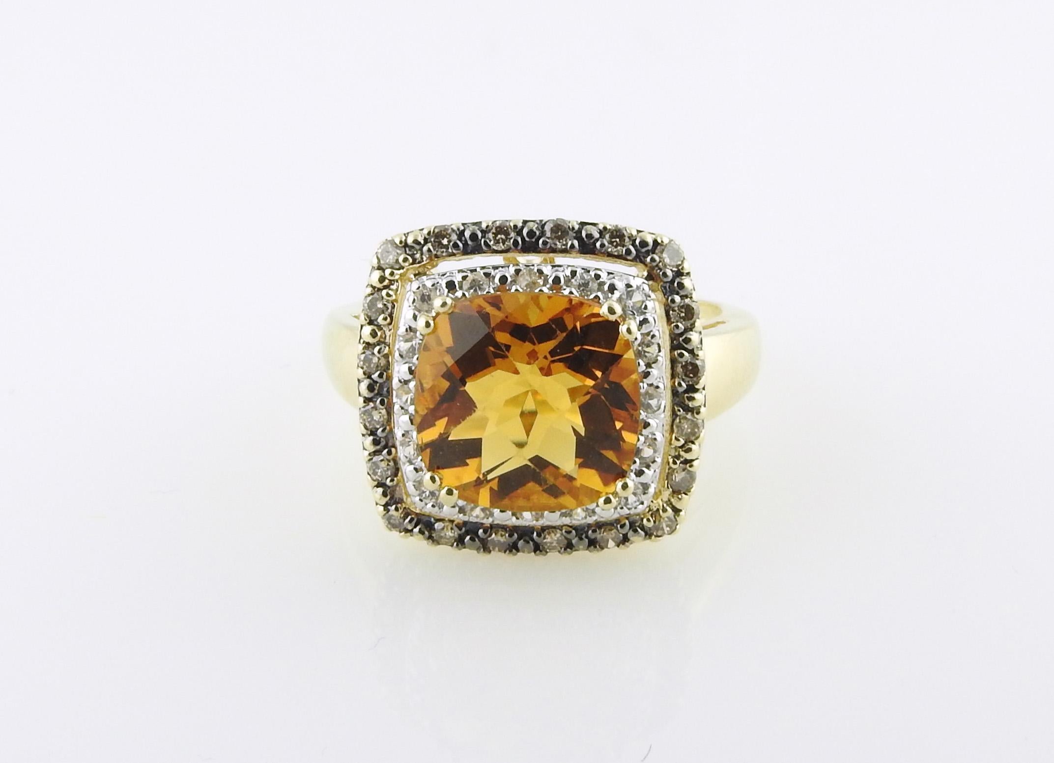 LeVian 14K Yellow Gold Cinnamon Citrine Halo Ring

This stunning LeVian ring is set in 14K yellow gold.

Center faceted Cinnamon Citrine stone is approx. 10mm x 10mm

The citrine is surrounded by a halo of white sapphires.

The outer halo is set