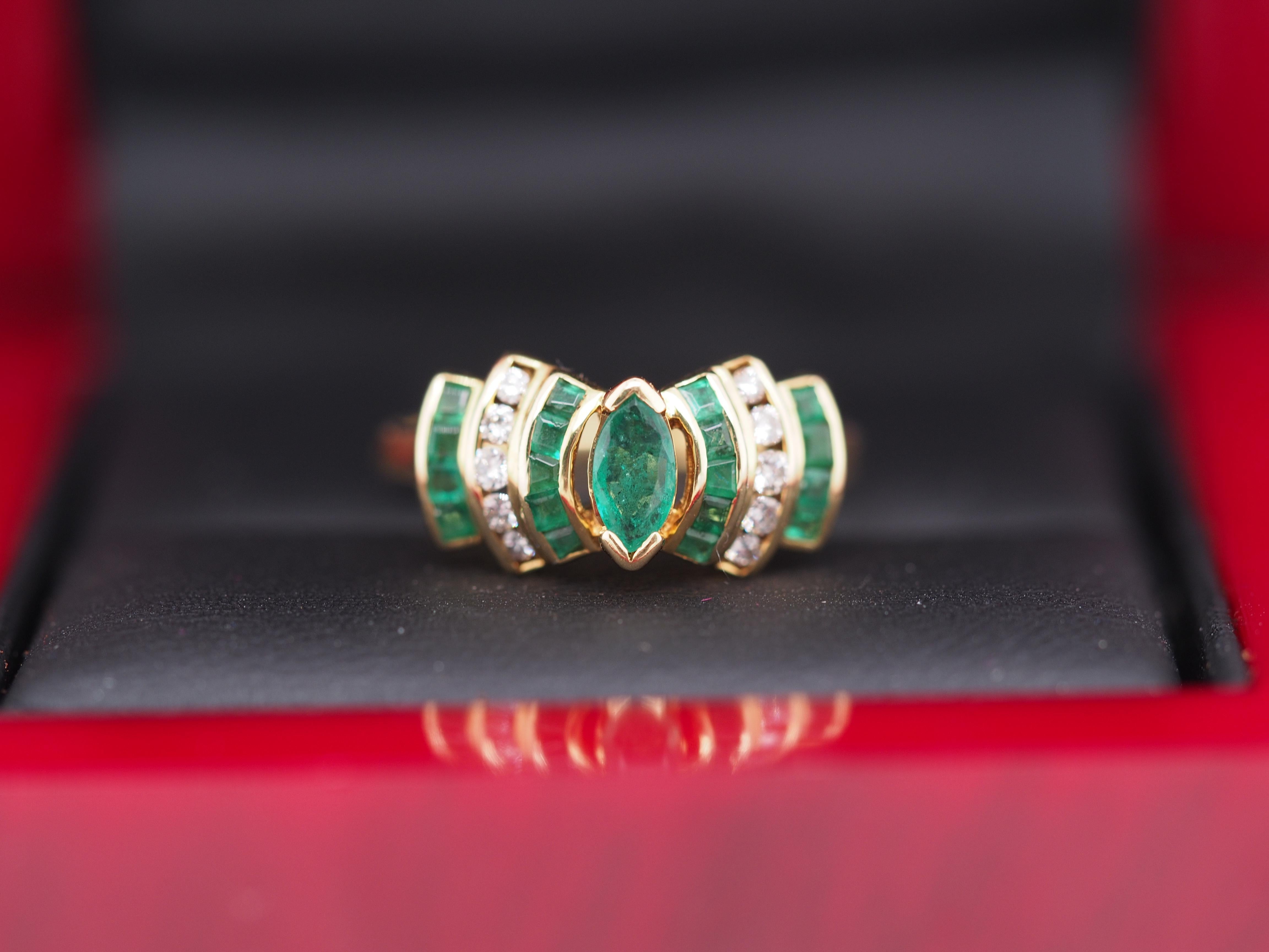 Year: 1990
Item Details: LEVIAN Designer
Ring Size: 6
Metal Type: 18K Yellow Gold [Hallmarked, and Tested]
Weight: 2.5 grams
Diamond Details
Emerald: Natural Emeralds 1.00cttw Square & Marquise Cut
Side Diamonds: Natural Round Diamonds .25cttw