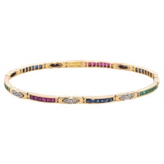 LeVian Tennisarmband aus 18 Karat Gelbgold mit Rubin, Saphir, Smaragd und Diamant