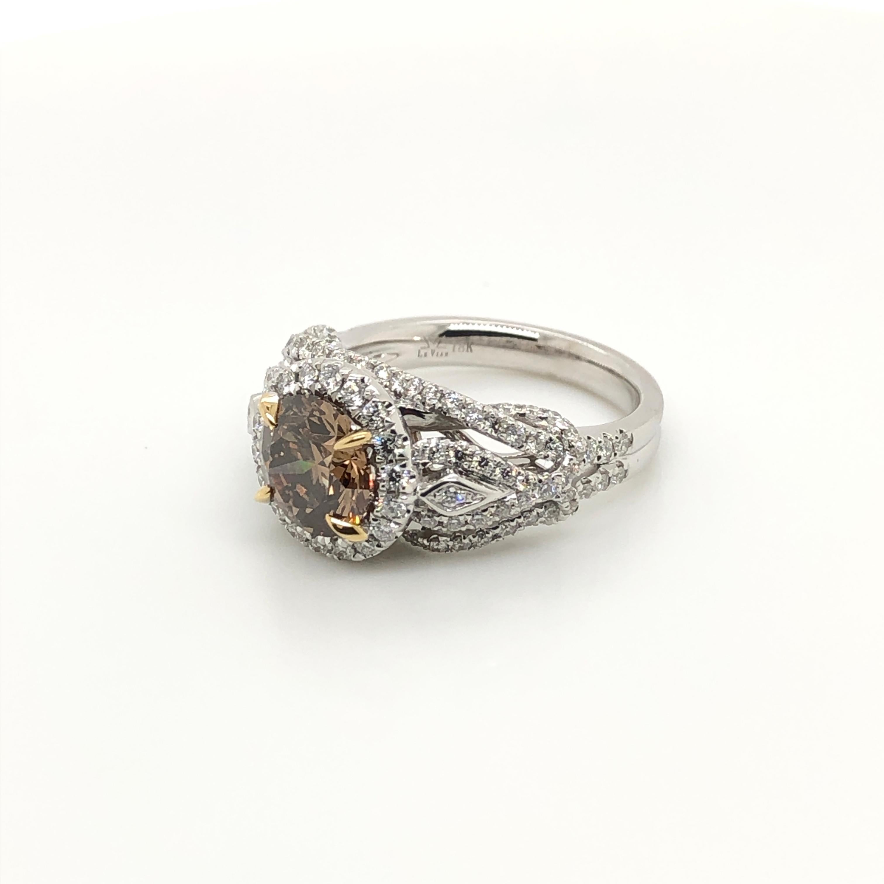 Sweetly  sophisticated, this stunning high profile 18k two tone gold engagement ring from Le Vian Couture features a 2-carat Chocolate Diamond nestled within a halo of Vanilla Diamonds, with exquisite sparkling diamond details revealed from every