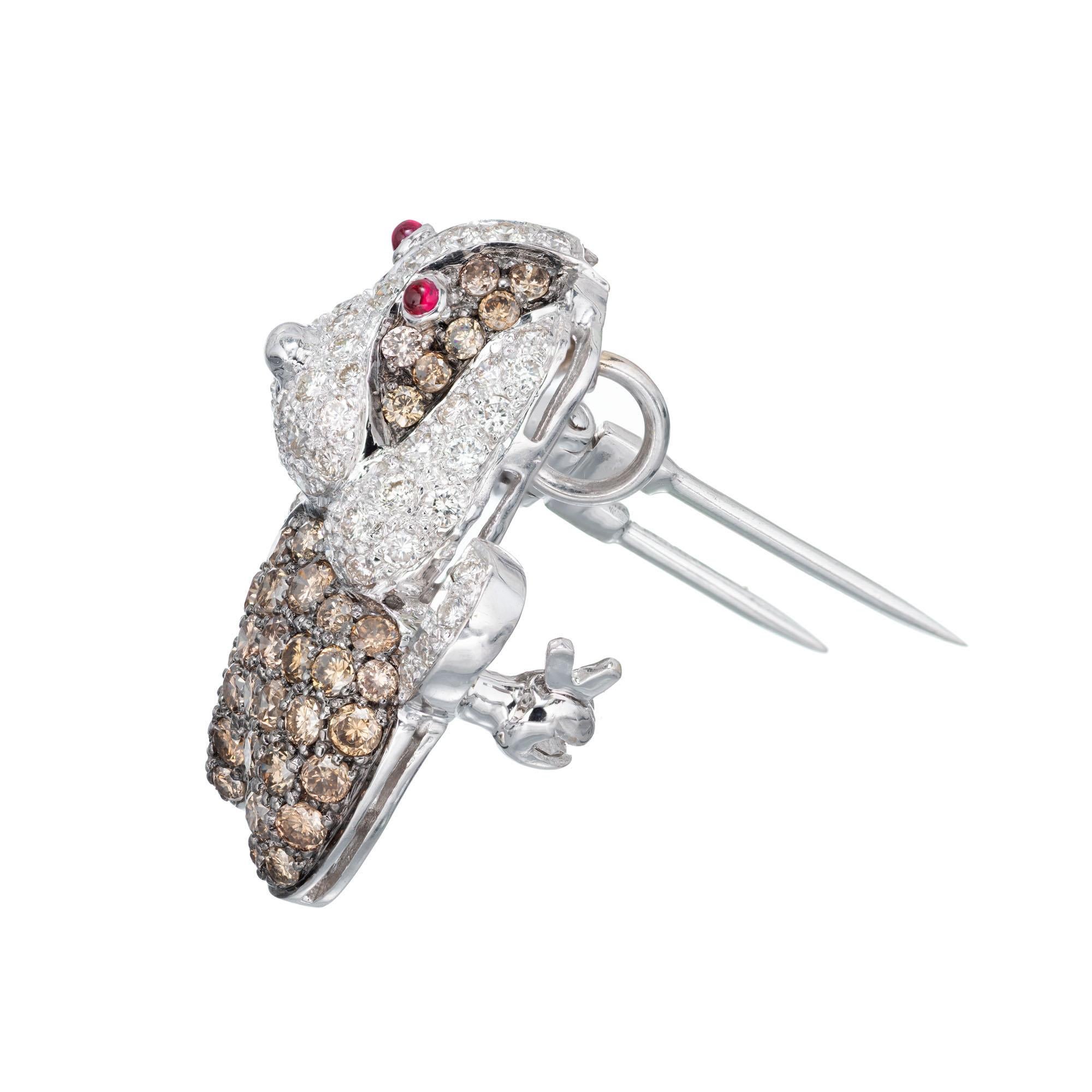 Levian 18k white gold pave set brown and white diamond, ruby dog brooch pendant.

71 round brilliant cut diamonds H-I VS-SI, approx.  .95cts
50 round brilliant cut champagne diamonds .75cts
2 round cabochon red rubies, approx. .4csts
18k white gold