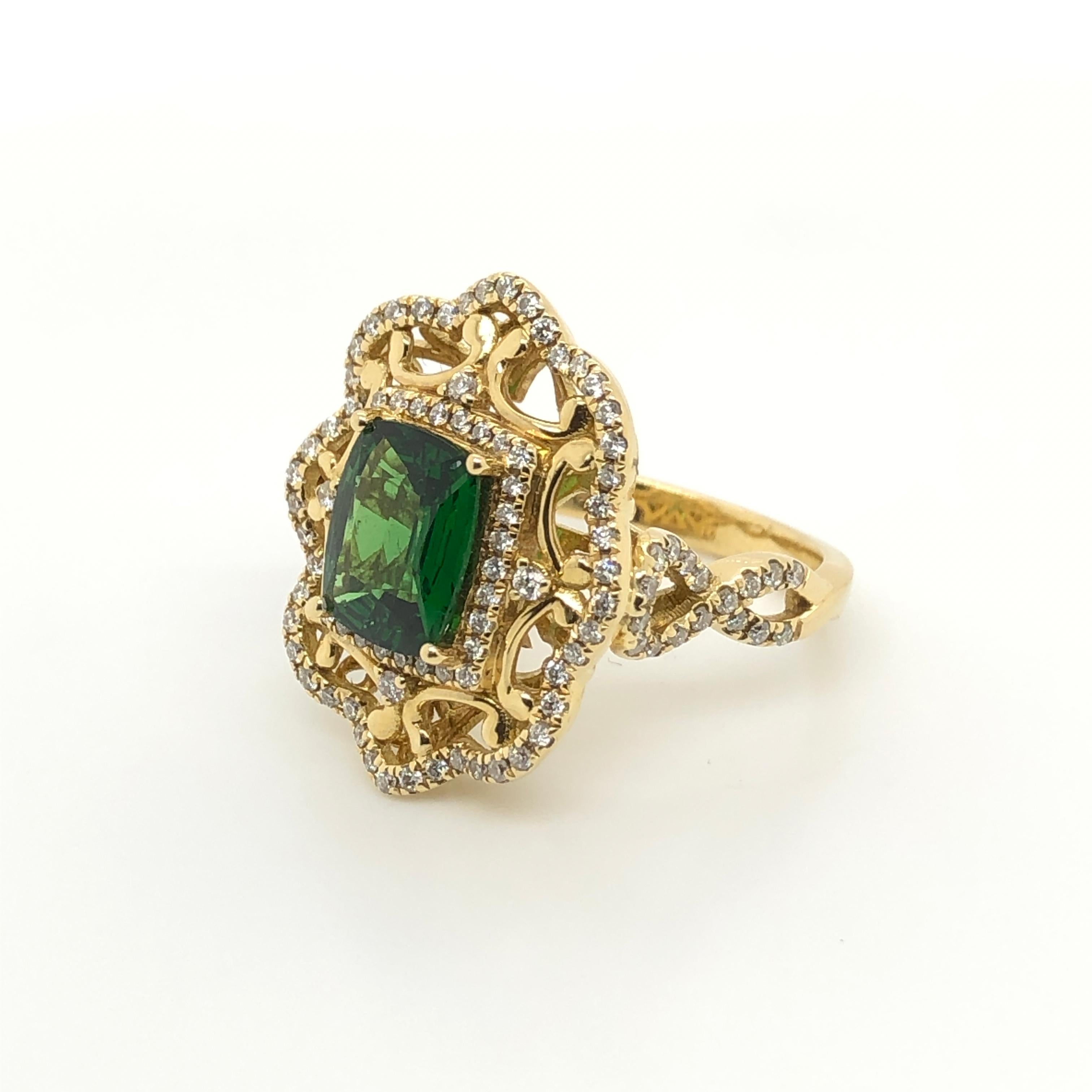 Fresh and lively best describes this 18k yellow gold ring from Le Vian Couture centered with a 2-carat cushion cut Tsavorite nestled within a halo of white diamonds in an elaborate scallop edged setting  accented with Vanilla Diamonds, 1/2 ct t.w.