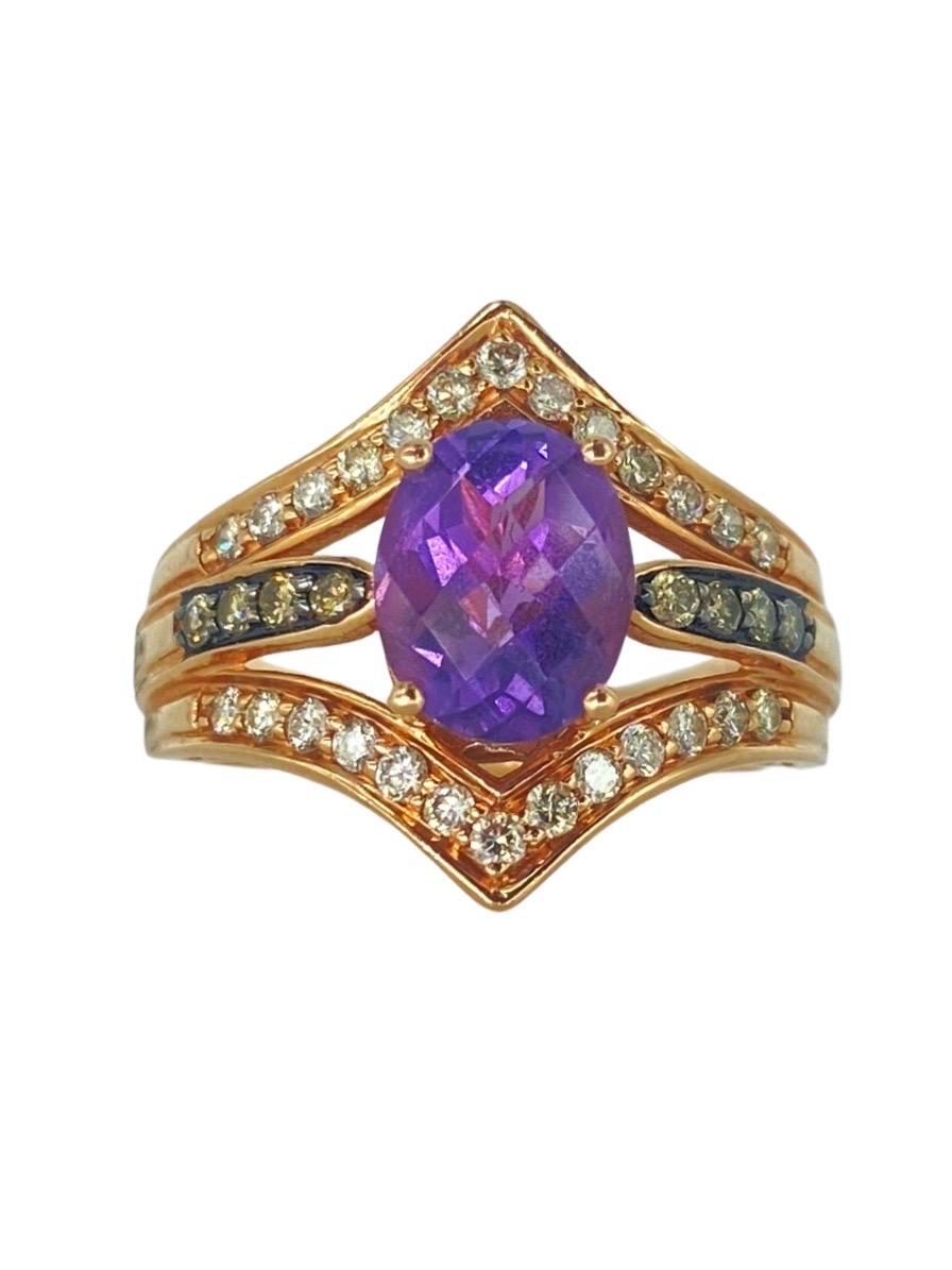 LeVian 2.30 Carat Amethyst and Diamonds Strawberry Gold 14m Ring. The center gemstone is an amethyst weighing approx 1.80 carat and surrounding diamonds are chocolate and vanilla diamonds weight approx 0.50 in total carat. The ring is a size 7 and