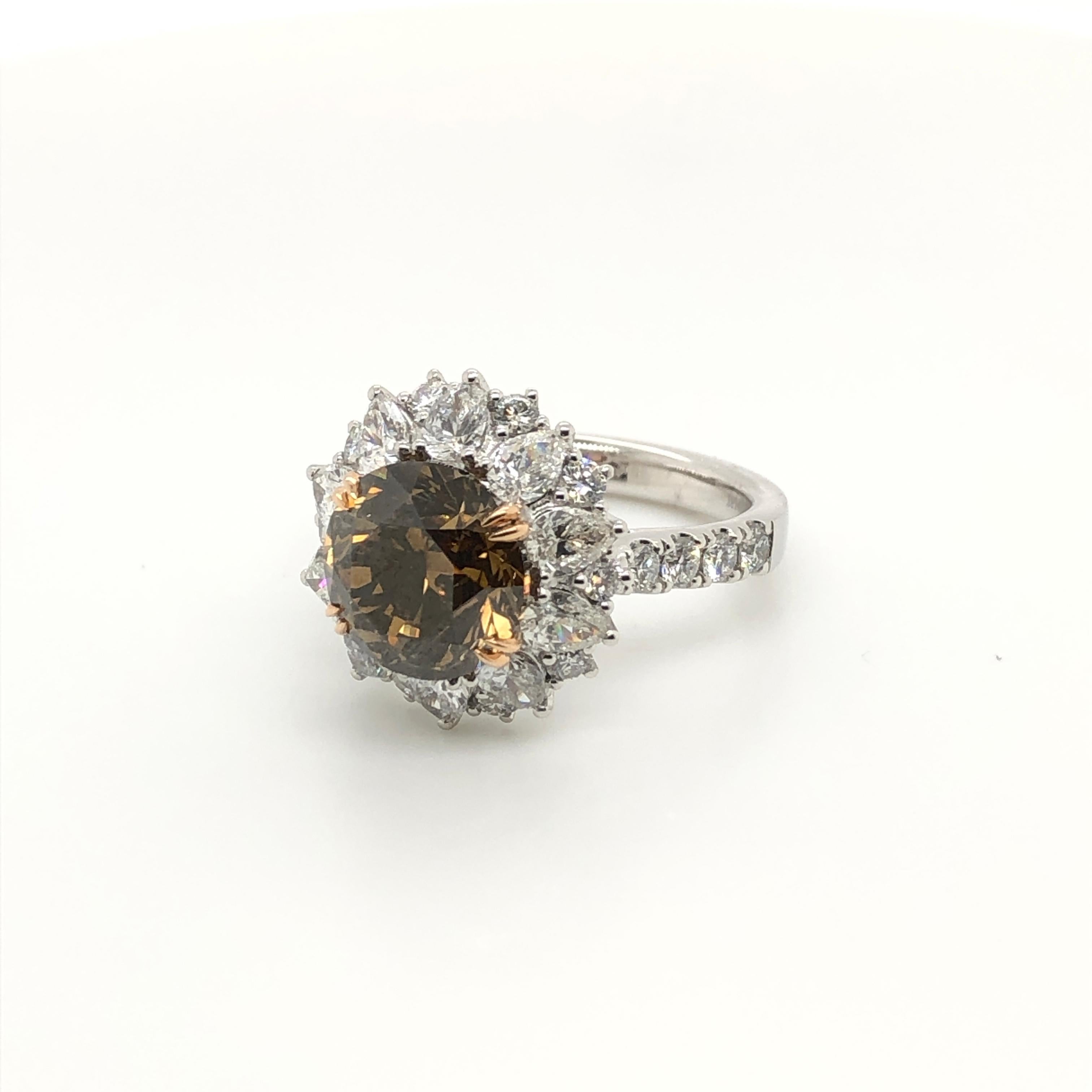 Pear-shaped petals of Vanilla Diamonds border a stunning 4-carat Chocolate Diamond in this Platinum and 18k gold ring from Le Vian Couture, 1-7/8 cts t.w. Vanilla Diamonds.
Ring Size: 7 

A Perfect Gift – Looking for a birthday or Mother’s Day gift