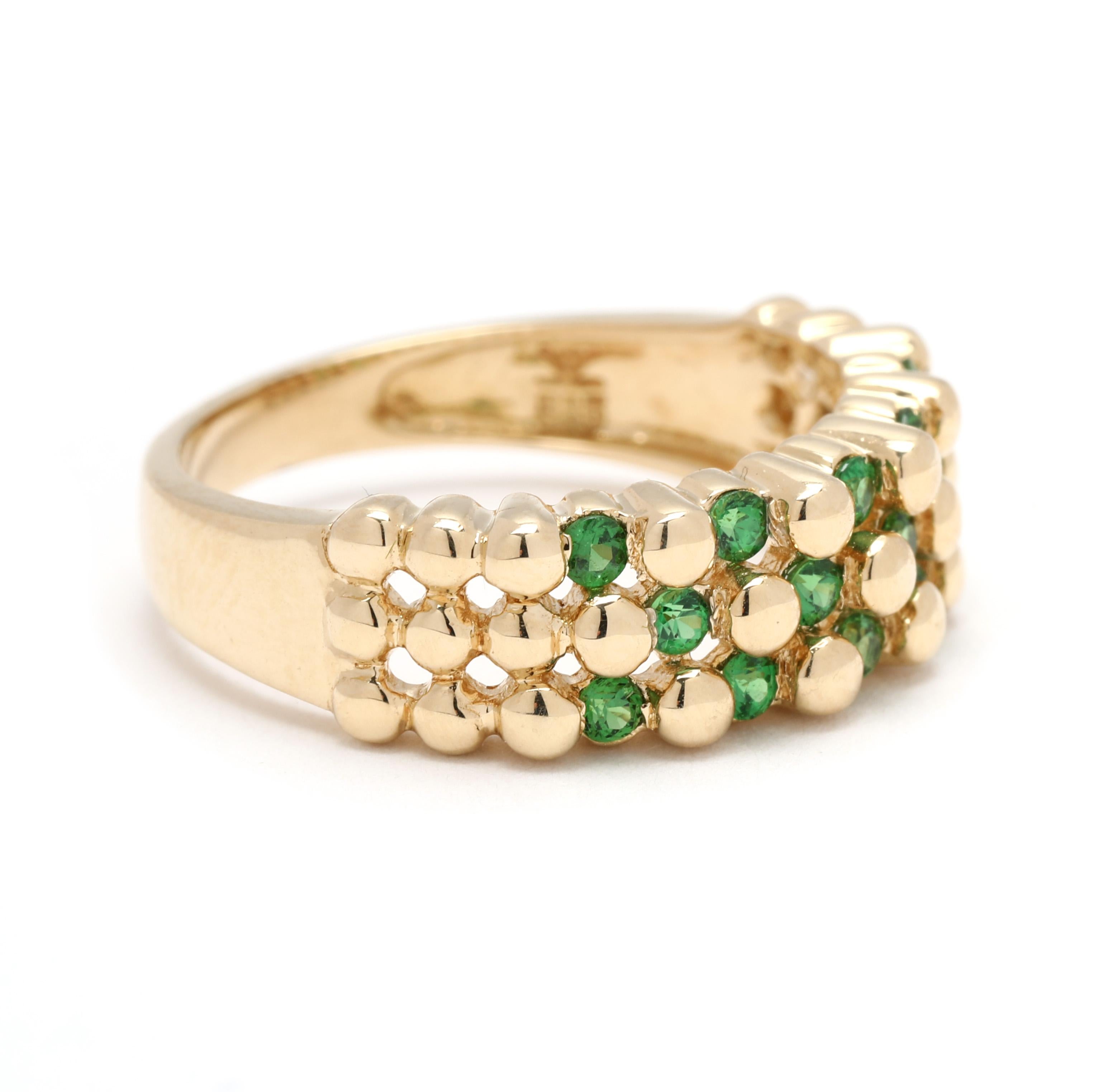 Stones:
tsavorite garnet, 14 stones
round
1.75 mm
.40ctw

Ring Size 6

Width: 6.5 mm

Weight: 2.4 dwts. / 3.7 grams

Stamps: 14k LeVian