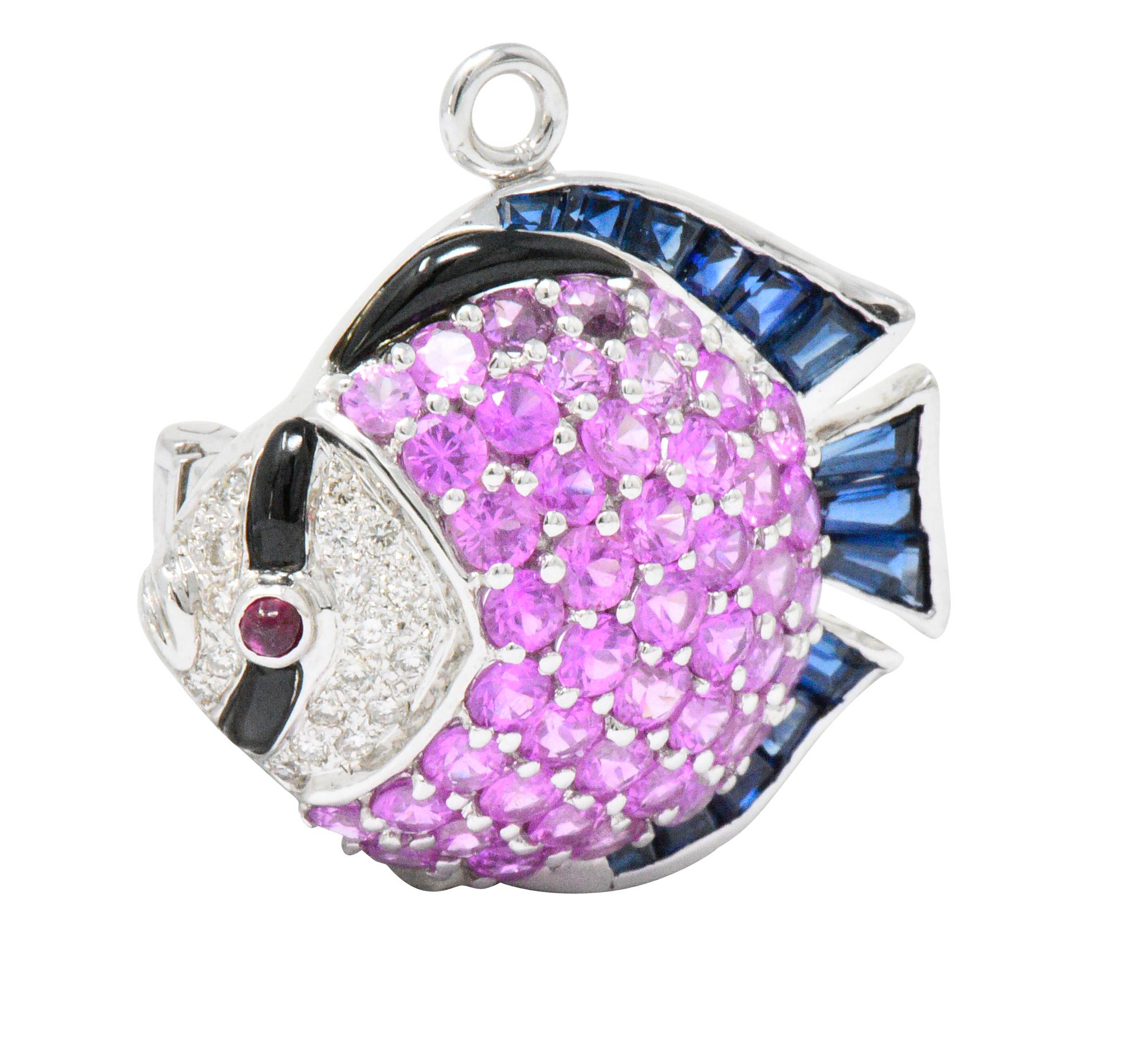 Designed as a tropical fish with a round cut pink sapphire set body, weighing approximately 3.70 carats, bright bubblegum pink and very well matched

With graduated and tapered baguette cut sapphire fins weighing approximately 0.70 carat

And a