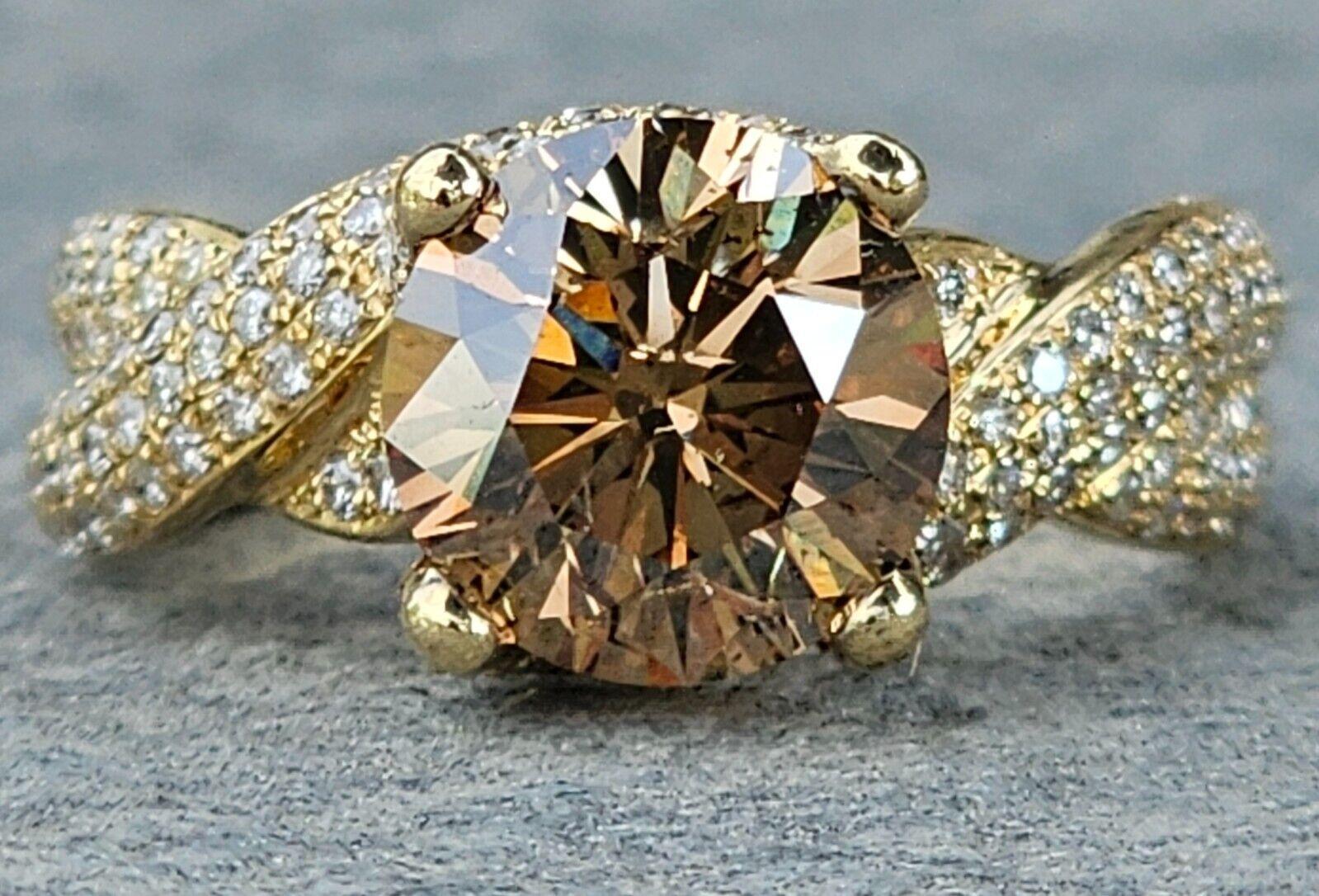 Here we have the most breathtaking Levian 18k gold 2.5ct center chocolate diamond engagement you will likely ever find! This one features an estimated 2.5ct center chocolate diamond! This is not the typical size for a Levian engagement ring. This