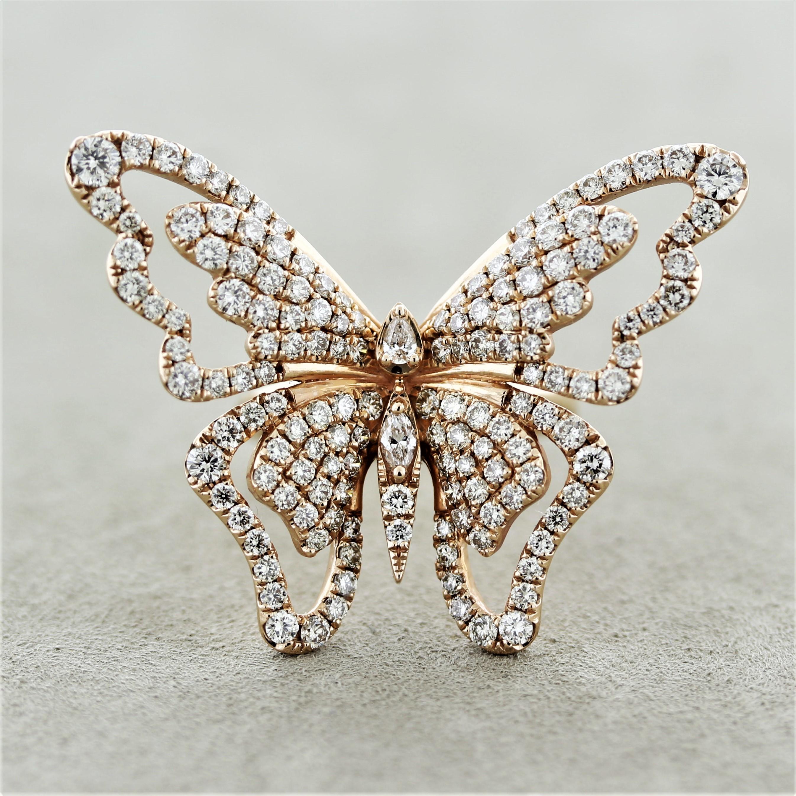 A fun and dazzling ring featuring 3 carats of round brilliant, pear, and marquise shaped diamond set over a lovely golden butterfly. The ring is made in 14k rose gold and ready to be worn.

Ring Size 7