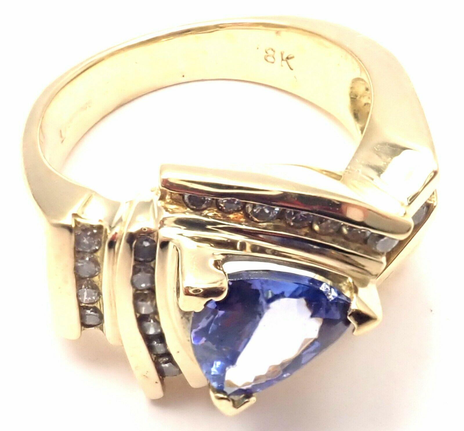18k White Gold Tanzanite & Diamond Ring by Levian.
With 33 round brilliant cut diamonds total weight approx. 1/2ct
1 Trillion cut Tanzanite approx. 1 1/3ct
Details: 
Size 5.5
Width 14mm
Weight: 9.8 grams
Stamped Hallmarks: LeVian 18k
*Free Shipping