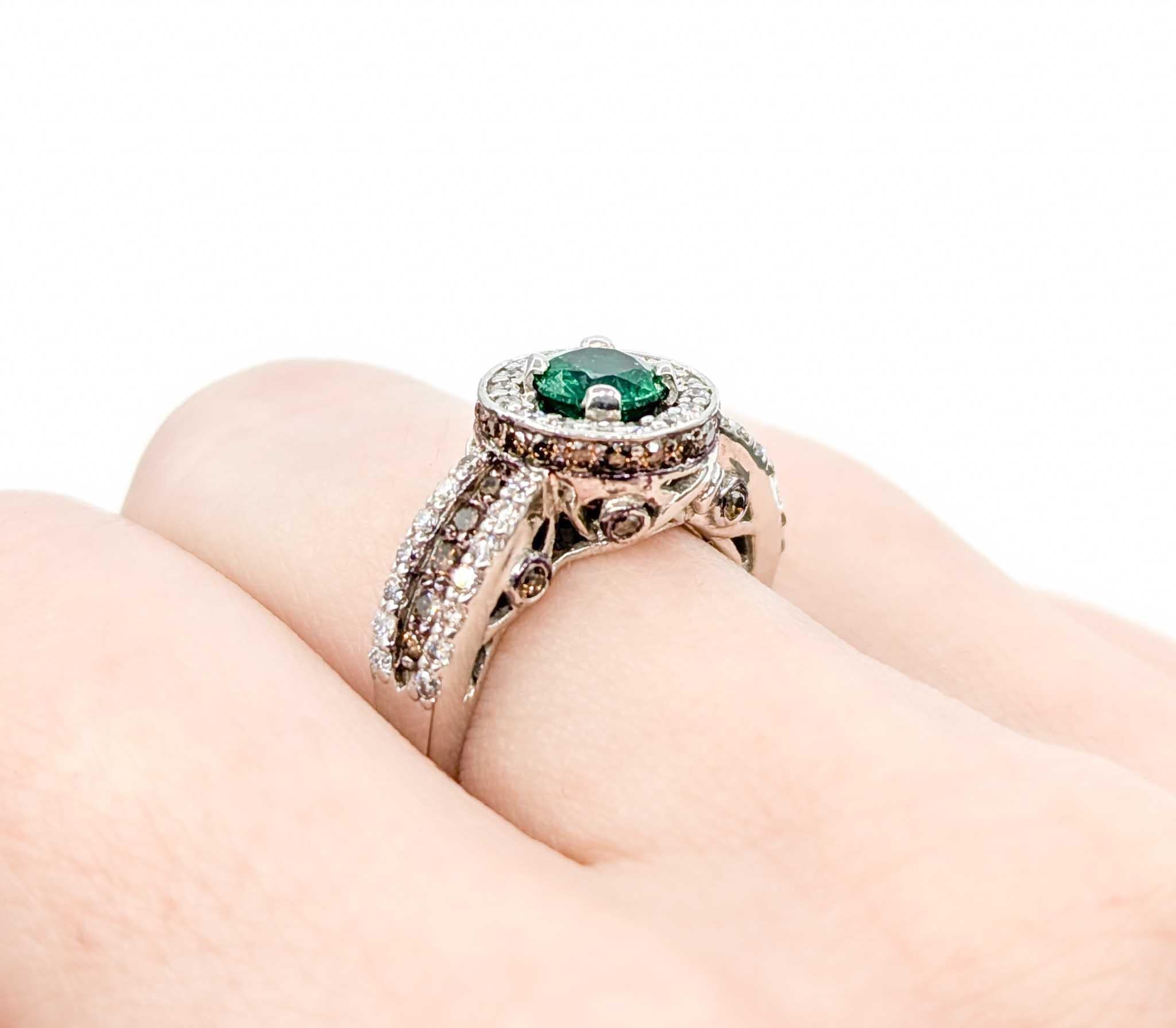 LeVian Emerald & Diamond Ring in 14k White Gold

This stunning LeVian ring is crafted in 14k white gold and features a 0.55ct emerald centerpiece, complemented by 0.75ctw of white and chocolate diamonds. The diamonds are VS-SI clarity with a near