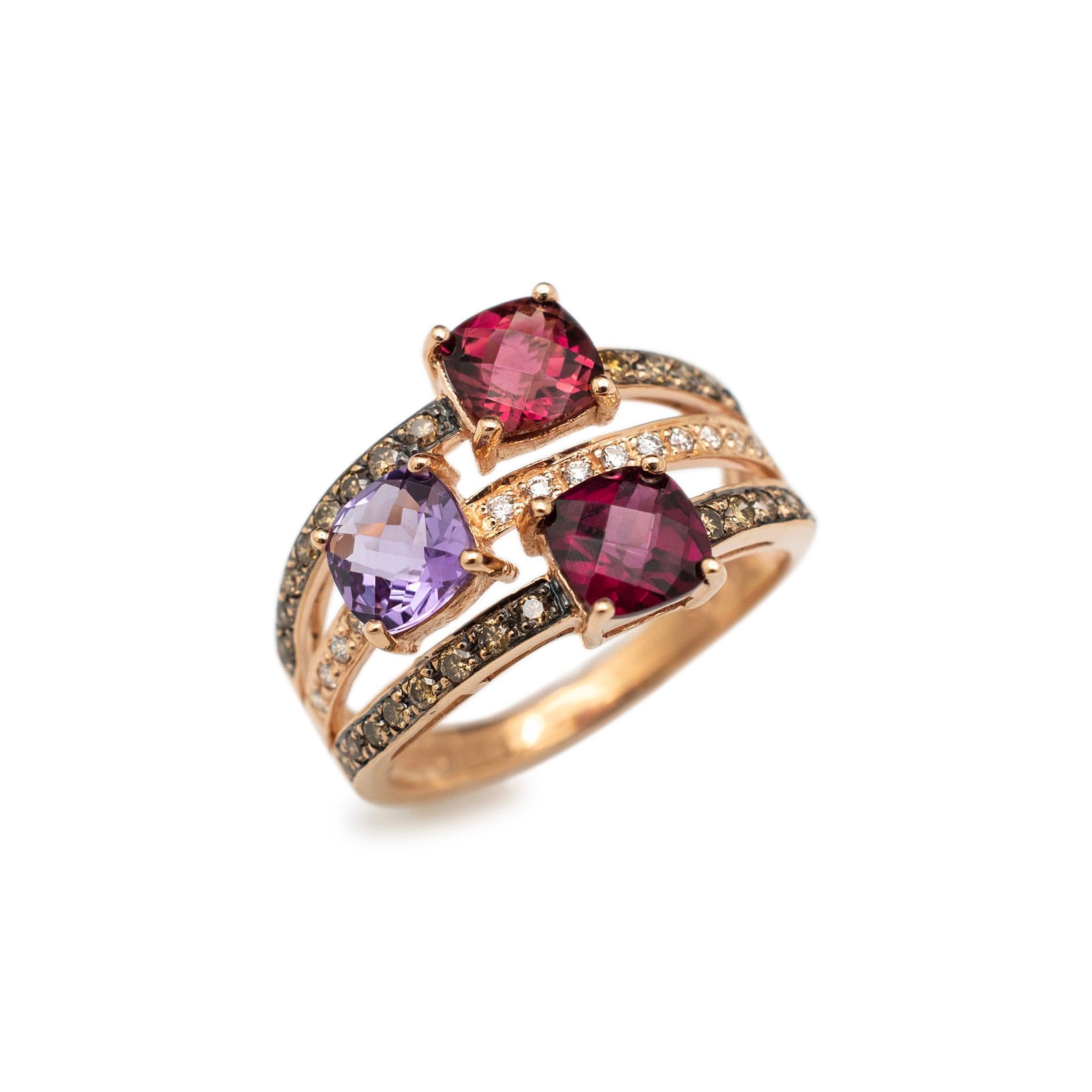Brand: Levian

Gender: Ladies

Metal Type: 14K Rose Gold

Size: 9

Shank Maximum Width: 14.80 mm tapering to 2.50 mm

Weight: 5.69 grams

Ladies 14K rose gold diamond tourmaline and rhodolite garnet cocktail ring with a tapered comfort-fit shank.