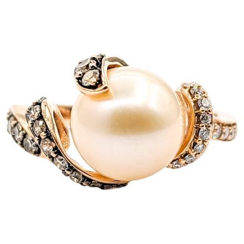 Levian Pearl & Diamond Ring in Rose Gold

Introducing our exquisite ring, a fusion of classic elegance and modern design. At the heart of this piece lies a captivating 9mm freshwater pearl, radiating timeless beauty. The ring is expertly crafted in