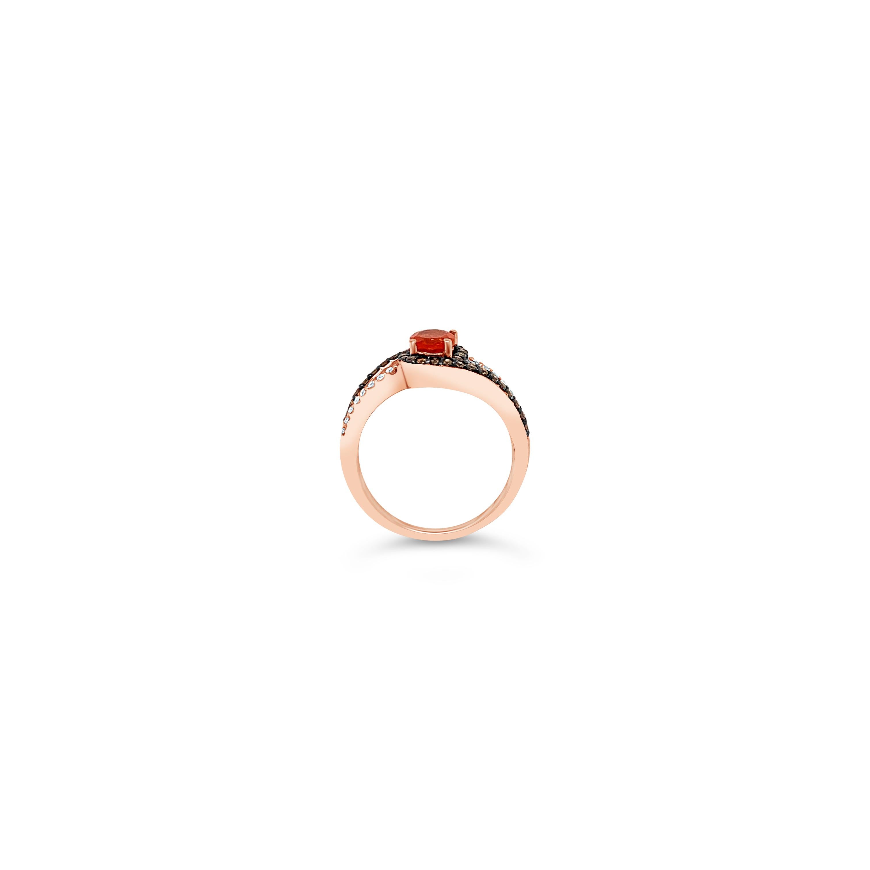 Le Vian Chocolatier® Ring featuring 0.35 cts. Neon Tangerine Fire Opal®, 0.33 cts. Chocolate Diamonds® , 0.08 cts. Vanilla Diamonds®  set in 14K Strawberry Gold®
Ring size 7 

A Perfect Gift – Looking for a birthday or Mother’s Day gift idea for