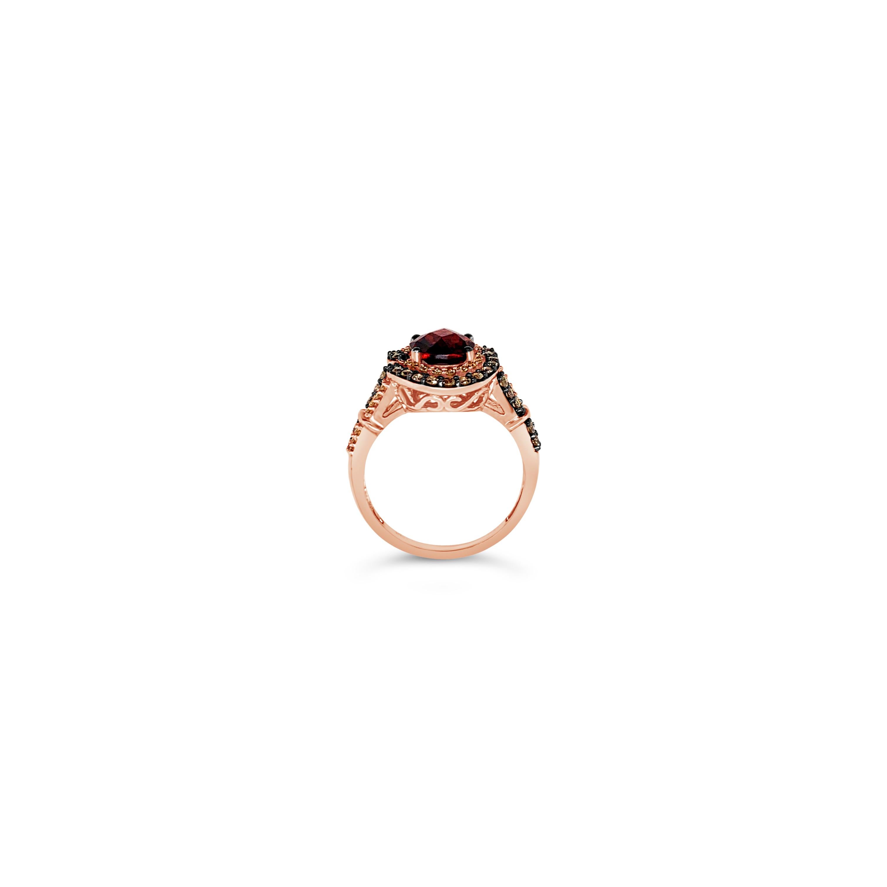 Le Vian Chocolatier® Ring featuring 2.35 cts. Pomegranate Garnet, 0.39 cts. Chocolate Diamonds®, 0.16 cts. Vanilla Diamonds® set in 14K Strawberry Gold®

Diamonds Breakdown:
.39 cts Brown Diamonds
.16 cts White Diamonds

Gems Breakdown:
2.35 cts
