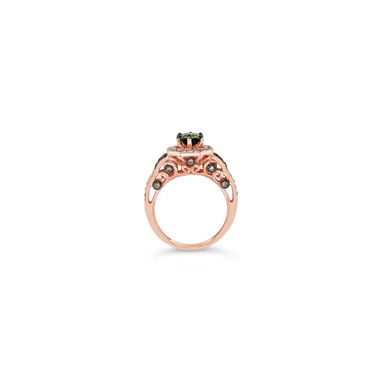 Le Vian Bridal® Ring featuring 0.94 cts. Green Sapphire, 0.23 cts. Chocolate Diamonds® , 0.31 cts. Vanilla Diamonds® set in 14K Strawberry Gold®

Diamonds Breakdown:
.31 cts White Diamonds
.23 cts Brown Diamonds

Gems Breakdown:
.94 cts Green