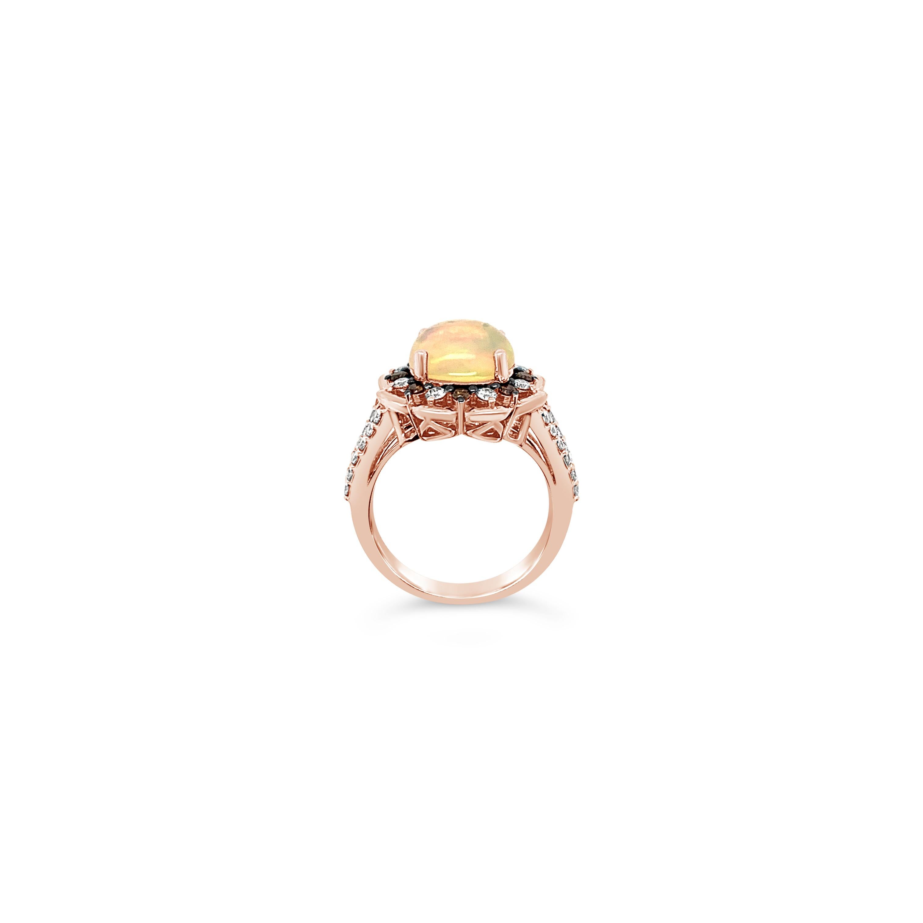 Le Vian Creme Brulee® Ring featuring 1.90 cts. Neopolitan Opal, 0.60 cts. Nude Diamonds, 0.17 cts. Chocolate Diamonds® set in 14K Strawberry Gold®

Diamonds Breakdown:
.60 cts Nude Diamonds
.17 cts Brown Diamonds

Gems Breakdown:
1.90 cts Opal

Ring