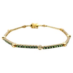 Bracciale Tennis LeVian con Granato Tsavorite e Diamanti a Stazione in oro giallo 14 carati