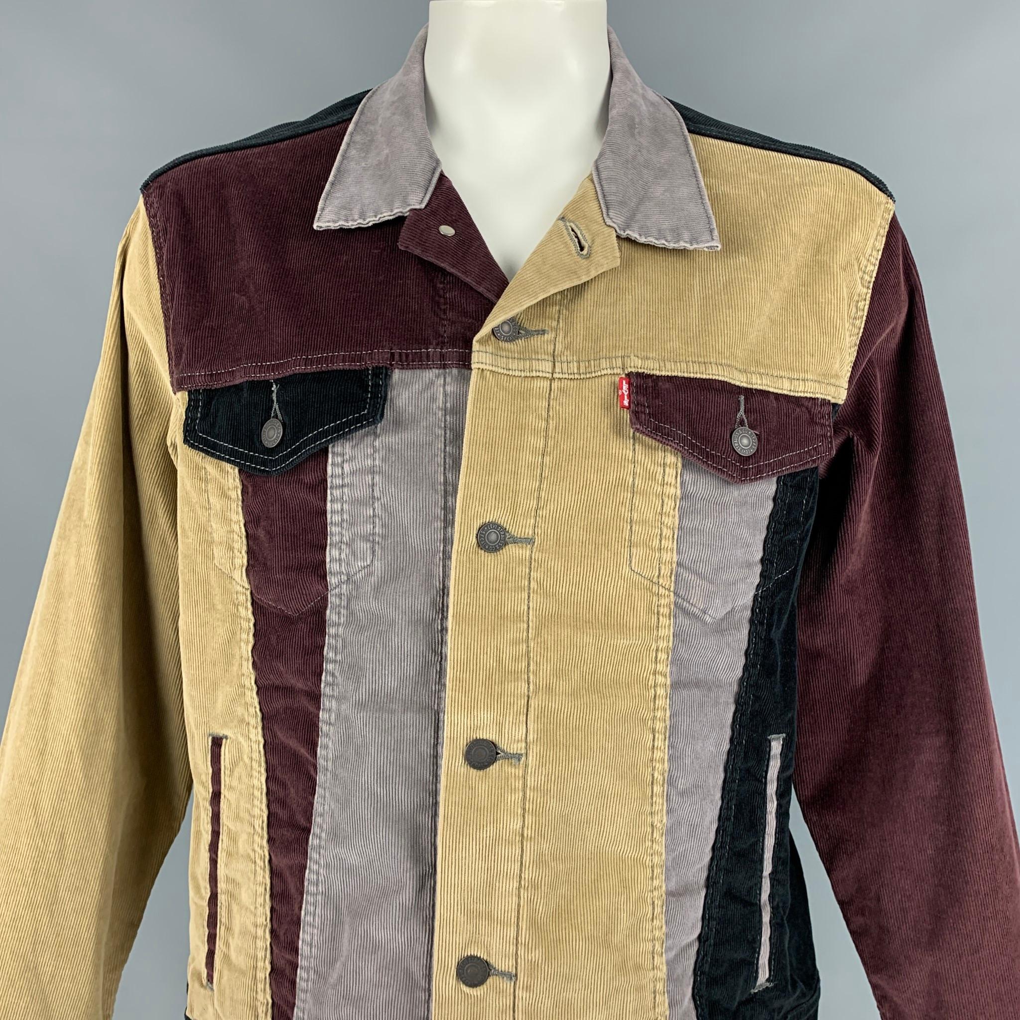LEVI'S PREMIUM jacket comes in a multi-color patchwork corduroy featuring a trucker style, front pockets, spread collar, contrast stitching, and a buttoned closure. 

Very Good Pre-Owned Condition.
Marked: XL

Measurements:

Shoulder: 21 in.
Chest: