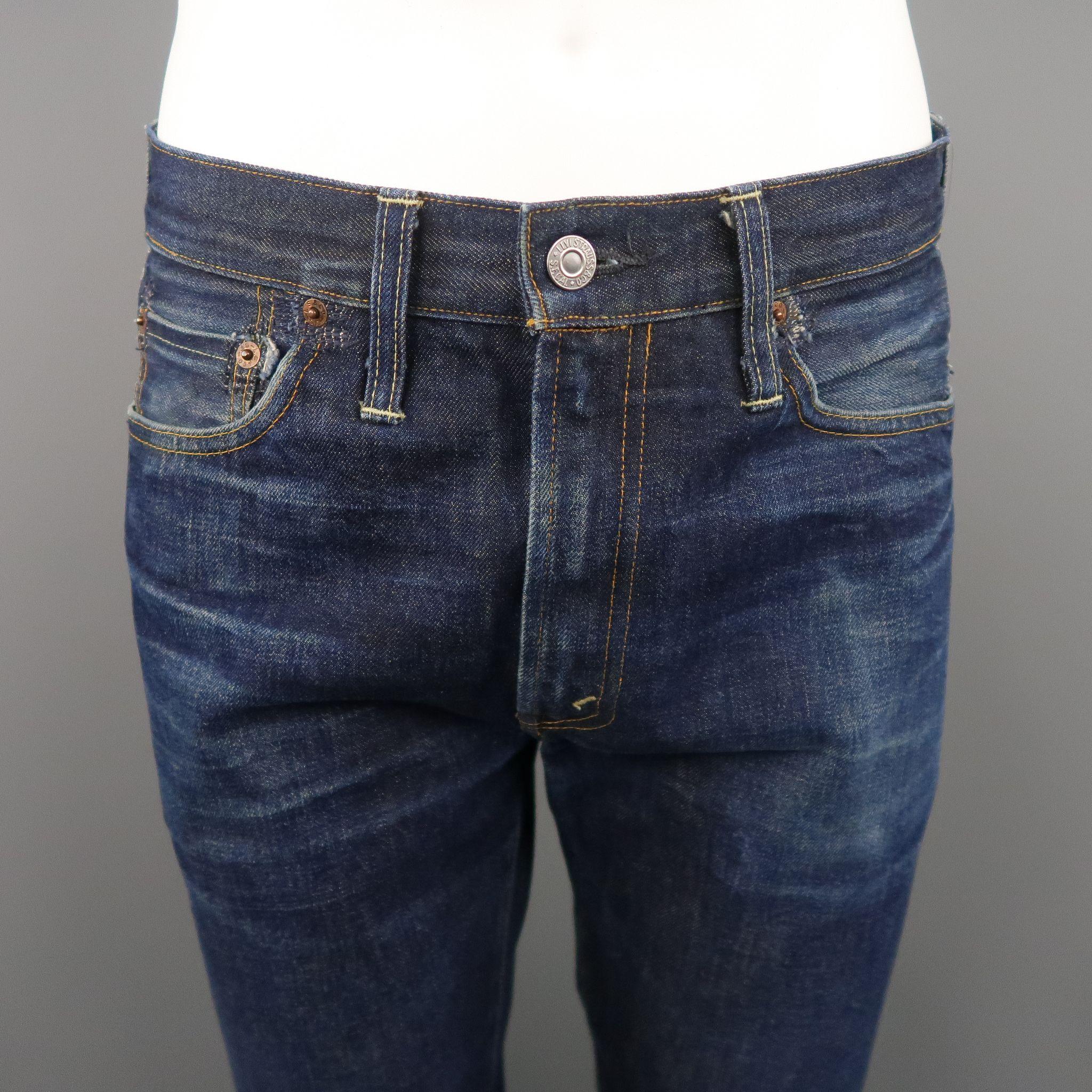 LEVI'S jeans comes in a indigo selvedge denim with a contrast stitch, distressed, with a contrast pale at back and zip fly. 501 Z XX Capital 