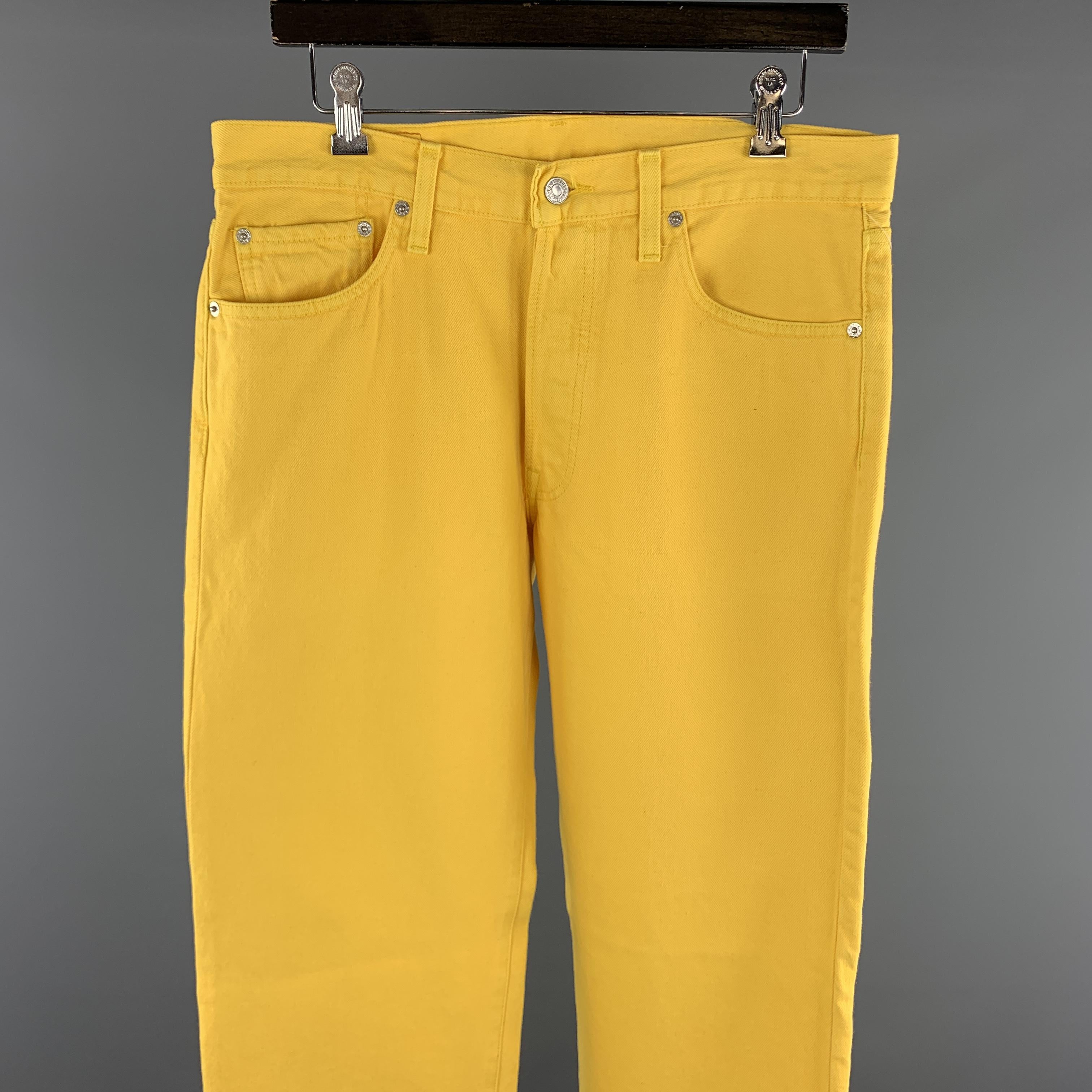 LEVI'S x 501 XX ALIFE casual pants comes in a yellow cotton featuring a jean cut style and a button fly closure. 


Very Good Pre-Owned Condition.
Marked: 34 x 32

Measurements:

Waist: 42 in. 
Rise: 9.5 in.
Inseam: 32 in.