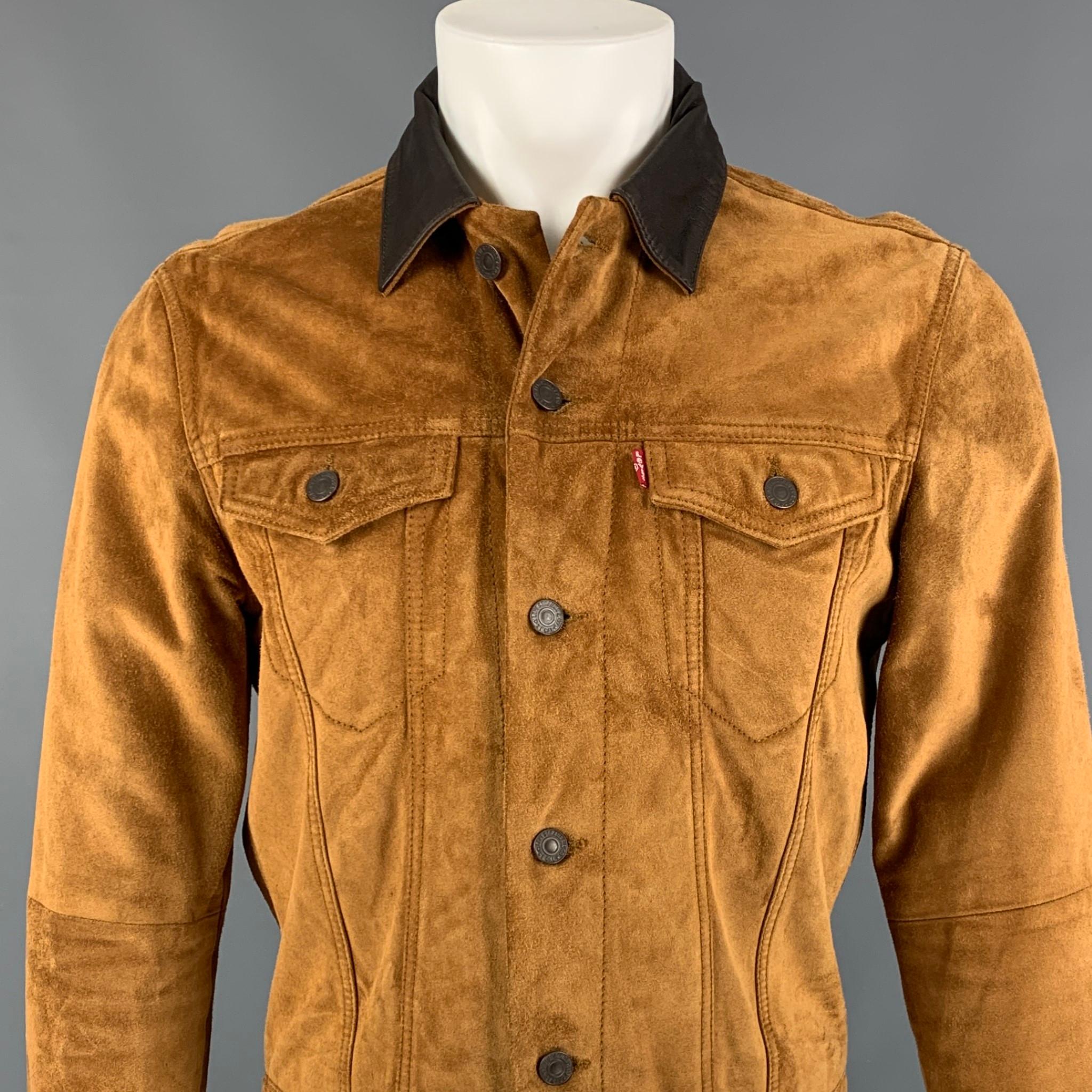 LEVI'S jacket comes in a tan suede featuring a trucker style, leather trim collar, front pockets, and a buttoned closure. 

Very Good Pre-Owned Condition.
Marked: M

Measurements:

Shoulder: 18 in.
Chest: 38 in.
Sleeve: 26 in.
Length: 24 in. 
