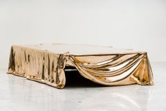 Table basse Levitaz, bronze coulé poli miroir, style contemporain